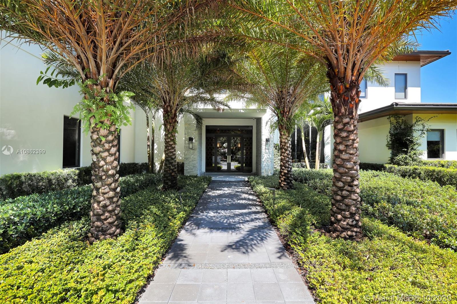 Spectacular 2017 Modern House with a great floor plan and volume ceillings in the highly  desirable Ponce Davis area. This 7 bedroom, 8.5 bathroom home sits on over a 35,000 SF Lot just off Old Cutler Road. Features include a large master suite, full summer kitchen, start-of-the-art appliances, movie theater, a security system, and many more. Within close proximity to the top schools, parks, restaurants, and shopping. A must see!!