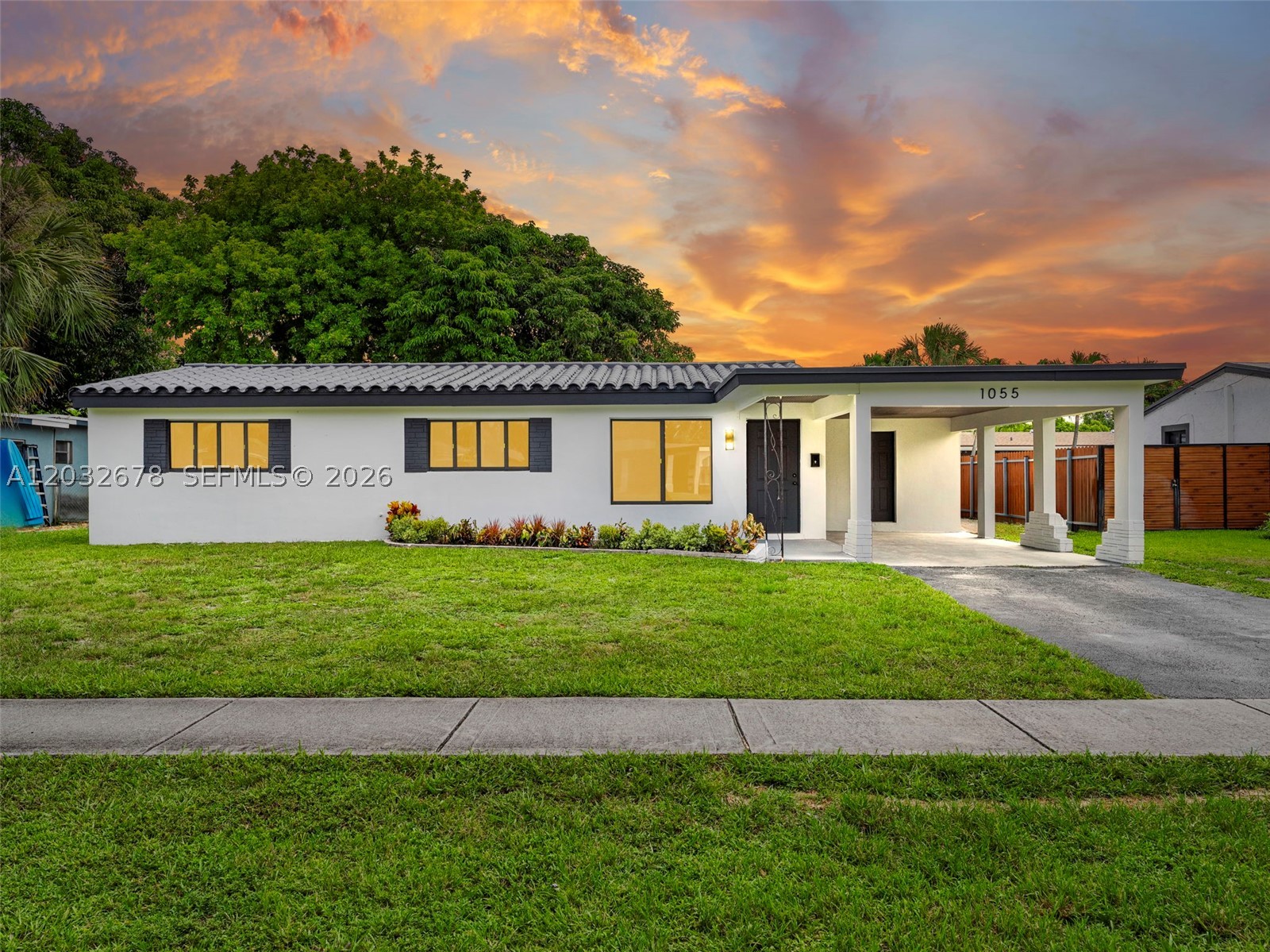 Step into luxury with this stunning fully remodeled modern home with 4 bedrooms and 3 bathrooms and a separate utility/laundry room. This open concept floorpan showcases designer finishes like a true model home. Porcelain tile flooring and recess lighting throughout, show stopper European flat two tone kitchen cabinets with brand new Smart Stainless Steel appliances. Best part of it all, the two master bedrooms, offer flexibility and comfort for multi generational living, guests or rental income. All NEW everything to make your life easier and give you peace of mind. Act quickly before it's gone.