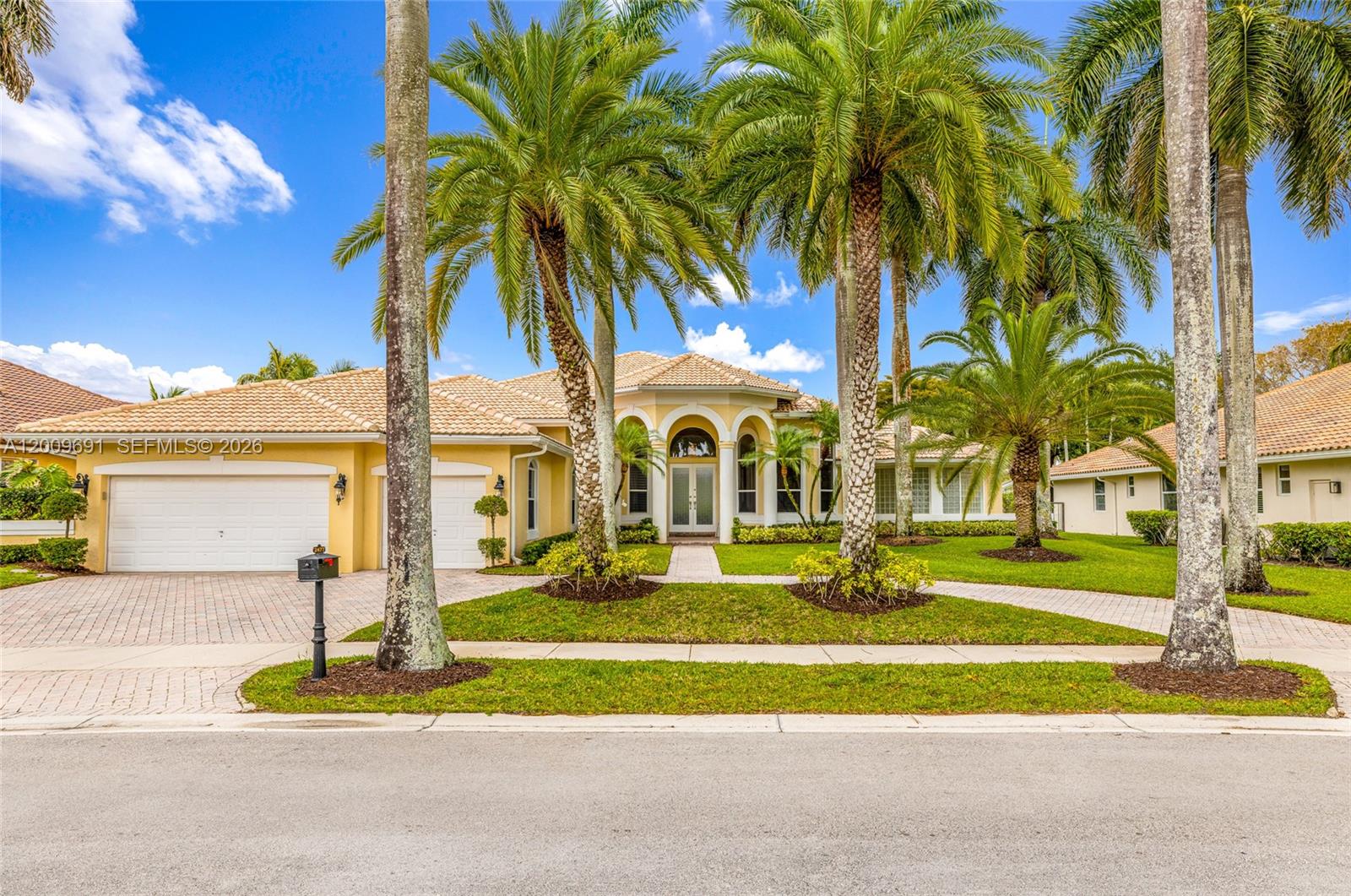 Absolutely stunning custom-built residence with spectacular golf course views, located in prestigious Weston Hills. This sophisticated home blends timeless elegance with modern comfort, offering 5 bedrooms, 3 full and 2 half bathrooms, plus a private office designed for today’s lifestyle. The gourmet kitchen features opal white cabinetry, an elegant center island, and built-in refrigerator, seamlessly integrating with the main living areas to create a perfect setting for both everyday living and entertaining. One of the rooms offers flexibility as a recreational space or guest bedroom, complete with a wet bar, ideal for both entertaining and accommodating visitors. Refined architectural details are showcased throughout, including Crema Marfil marble floors, coffered ceilings, crown molding, motorized blinds, and a family room with an electric fireplace, adding warmth and sophistication. The outdoor area enhances the lifestyle experience with a private pool and an upgraded patio flooring, all overlooking serene golf course views. Ideally located within an A+ rated school district, this exceptional property offers an outstanding combination of luxury living, lifestyle, and top-tier education. A truly special home that must be experienced in person to be fully appreciated.