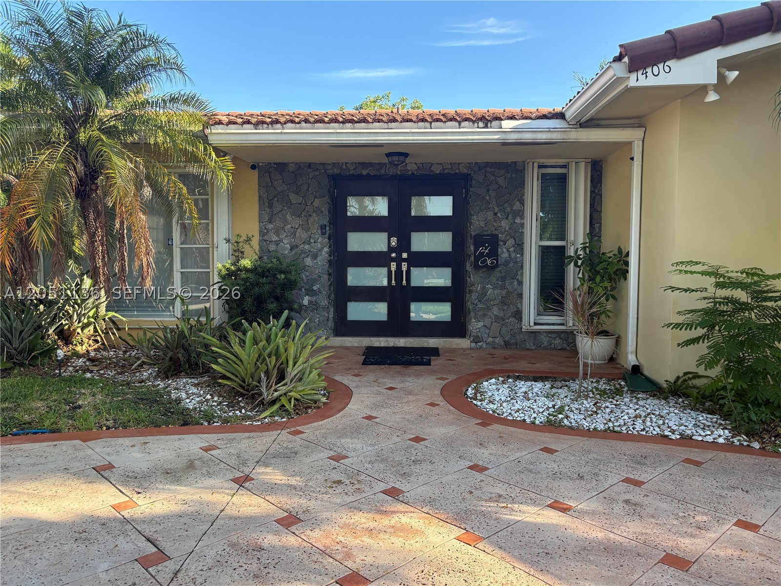 Nestled in one of Hollywood's most desirable neighborhoods, this beautifully maintained 3-bedroom, 2-bath residence is located just 1.6 miles from Hollywood Beach Park, the Intracoastal Waterway, shopping, dining, and entertainment. The home features elegant marble flooring throughout, a spacious sunken living room, a formal dining area, and an updated European-style kitchen with granite countertops, freshly refinished cabinetry, and stainless steel appliances. Step outside to your own private tropical oasis, thoughtfully designed for entertaining. The expansive backyard features mature fruit trees, a large swim spa, a custom-built pergola, an inviting outdoor dining area, and plenty of room to relax while enjoying South Florida's year-round lifestyle.
Additional highlights include a circular driveway with ample parking and a versatile room currently used as a home gym, offering flexible space for a home office, fitness studio, playroom, or hobby room.
Meticulously maintained and move-in ready, this exceptional home offers the perfect blend of comfort, style, and location. Whether you're looking for a primary residence, a second home, or an investment property, this is a rare opportunity to own a beautiful home in one of Hollywood's most sought-after neighborhoods.