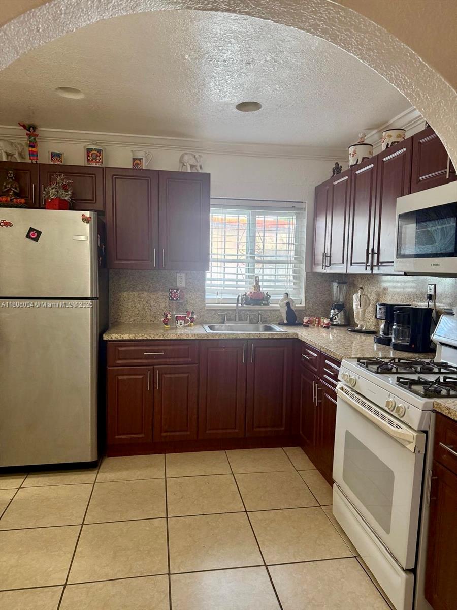 CAROL CITY GDNS 1ST ADDN - Residential