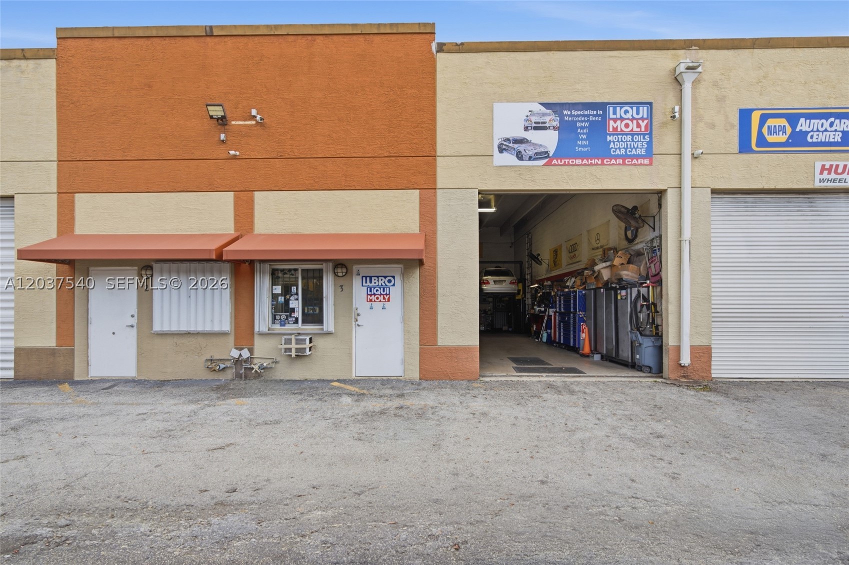 This is the kind of deal that doesn't come around twice. A commercial warehouse condo for sale fully equipped, drive-in access, room for up to 8 vehicles AND one of Miami's most respected auto repair shops all in one transaction. 25 years in business. A loyal clientele built over decades, a 4.5-star reputation, and a business that simply runs. All licenses and permits are current, compliant, and transfer with the sale and with Miami-Dade's increasingly strict zoning restrictions on new auto repair shops, this grandfathered location is a rare and highly protected asset that cannot be easily replicated. Goodwill, equipment, branding, and client base all transfer to the new owner. Zoned IU-1 (Industrial, Light Manufacturing) one of Miami-Dade's most versatile commercial designations. Keep the auto shop, pivot to warehousing, distribution, fabrication, or detailing. The space works for your vision. Located next to Tamiami Airport seconds from the Florida Turnpike, surrounded by Kendall, Westchester, and Sweetwater. High daily traffic, dense residential demand, and a thriving commercial corridor that has kept this business alive and growing for 25 years. Stop paying rent. Start building equity. Financials available upon NDA execution. Do not disturb business or employees. Showings by appointment only.