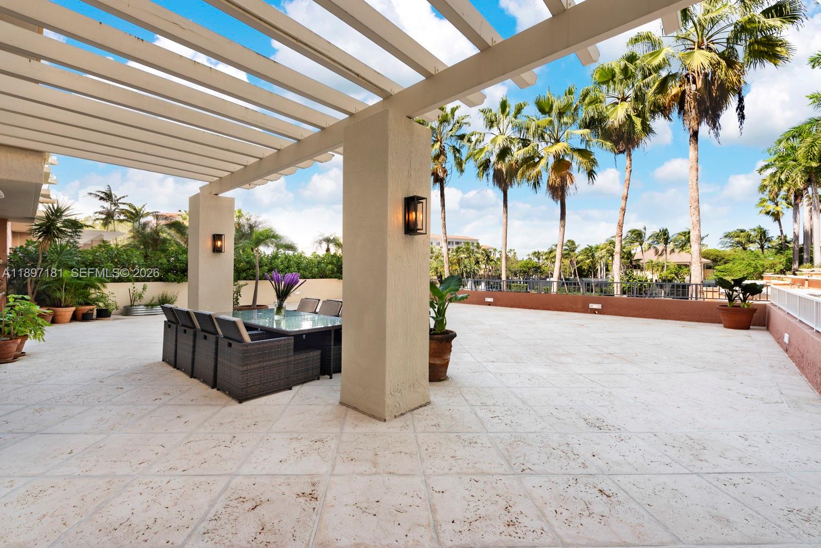 Welcome to a truly  spectacular home in the prestigious Lake Tower at Ocean Club. This one-of-a kind residence boasts an oversized LANAI terrace (over 2000sqft) with pretty lake views, a perfect setting for outdoor children's play area, dining, and entertaining. The apartment is in impeccable condition, offering a thoughtfully designed layout with three spacious en-suite bedrooms, plus separate staff quarters with a private bathroom. A versatile additional space serves beautifully as a family room, playroom, media room, or even another bedroom, tailored to suit your lifestyle. Lots of storage and built-in surround sound elevate the living experience. Lake tower is a boutique building with 75 units that provides all the amenities: 24-hour concierge, valet parking, etc..