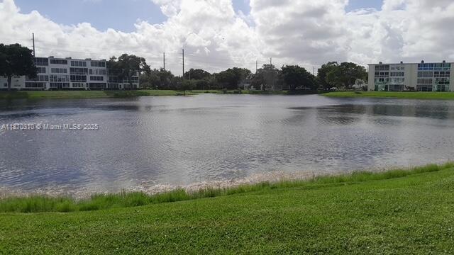JUST REDUCED!!! YOU CAN'T MISS THIS GORGEOUS 1ST. FLOOR LAKE FRONT UNIT IN THE BEST LOCATION OF THE BEAUTIFUL CENTURY VILLAGE EAST. FEAUTURES 1 BED.,1.5 BATH.,NICE SIZE LIVING AND DINNING ROOMS, ALL WHITE KITCHEN WITH TOP OF THE LINE APPLIANCES AND GRANITE COUNTERS. SPACIOUS AND BRIGHT BEDROOM WITH WALL TO WALL CLOSET, AMAZING ENCLOSED PATIO/FLORIDA WITH BREATHTAKING LAKE VIEWS FOR YOUR RELAX AND ENTERTAINMENT, WALKING DISTANCE TO THE POOL,ASSIGNED PARKING AND STORAGE, STEPS AWAY TO THE LAUNDRY ROOM, BBQ AREA,FREE TRANSPORTATION TO GROCERY STORES,SHOPPING CENTERS AND BEACH, STATE OF THE ART CLUBHOUSE WITH GYM,GAME ROOM, THEATER, AND LOTS OF DAILY ACTIVITIES AND AMENITTIES, RENTABLE AFTER THE FIRST YEAR, HURRY UP...AT THIS PRICE WON'T LAST!!! BRING YOUR BEST OFFER, OWNER IS VERY MOTIVATED.