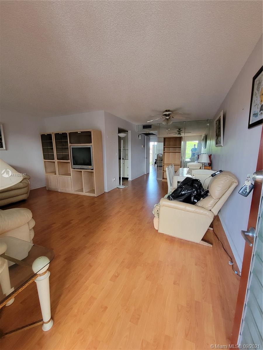 Spacious 1 bedroom 1.5 bath condo in 55+ community of Century Village. Parking right outside the entrance. Large open kitchen with plenty of cabinets and pantry. No neighbors in back. Private entrance conveniently located near the laundry room and elevator. Two storage closets, Probate Sale. Unit needs to be updated but has great potential. Friendly adult community with resort-like living Clubhouse, movies, fitness center, transportation, free golf, pharmacy, cafe, medical center, 24 hr security patrol, marketplace with hair salon, and 24 hr emergency nurses.