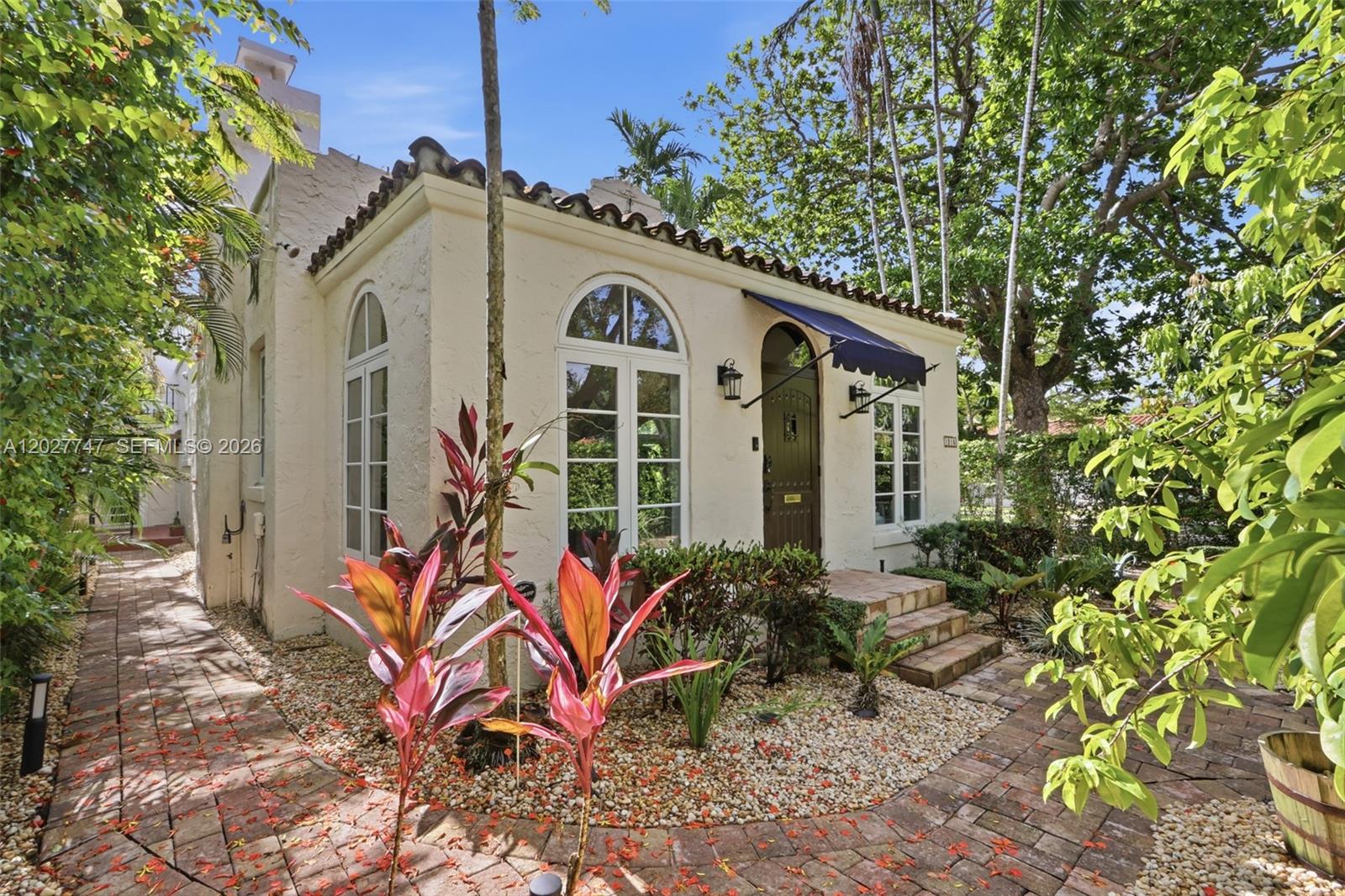 Beautifully remodeled 3-bed/3-bath Old Spanish style home, offering the perfect blend of modern comfort and timeless charm, located in highly desirable North Gables. Original Dade County pine details, and rich red oak flooring preserve the home’s classic character while each space feels thoughtfully and stylishly updated. Situated on a private corner lot, the 2-bed/2-bath main residence features an all-new primary bedroom suite with walk-in closet. Both bathrooms are spacious and well-lit with beautiful finishes. A stunning, bright, all-new kitchen with quartz countertops, marble flooring, custom cabinetry, KitchenAid appliances, and induction stovetop welcomes cooks of any skill. The true added value of this property is the spacious 1-bed/1-bath apartment with living area, kitchenette, and laundry, providing exceptional flexibility for guests, extended stays, rental income, or additional living space. A rare, finished 2-car garage with epoxy floor and new mini-split A/C, new washer and dryer, magical landscape lighting for pleasant evenings, and sprinkler system complete this move-in ready property. Blocks from the Granada Golf Course, Venetian Pool, tennis courts, neighborhood playgrounds, dog parks, and downtown Coral Gables, this home offers a perfect peaceful oasis in the midst of the City Beautiful.