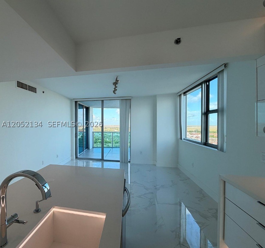 TAO SAWGRASS CONDOMINIUM - Residential