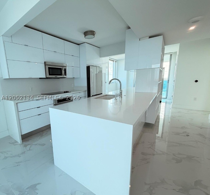 TAO SAWGRASS CONDOMINIUM - Residential