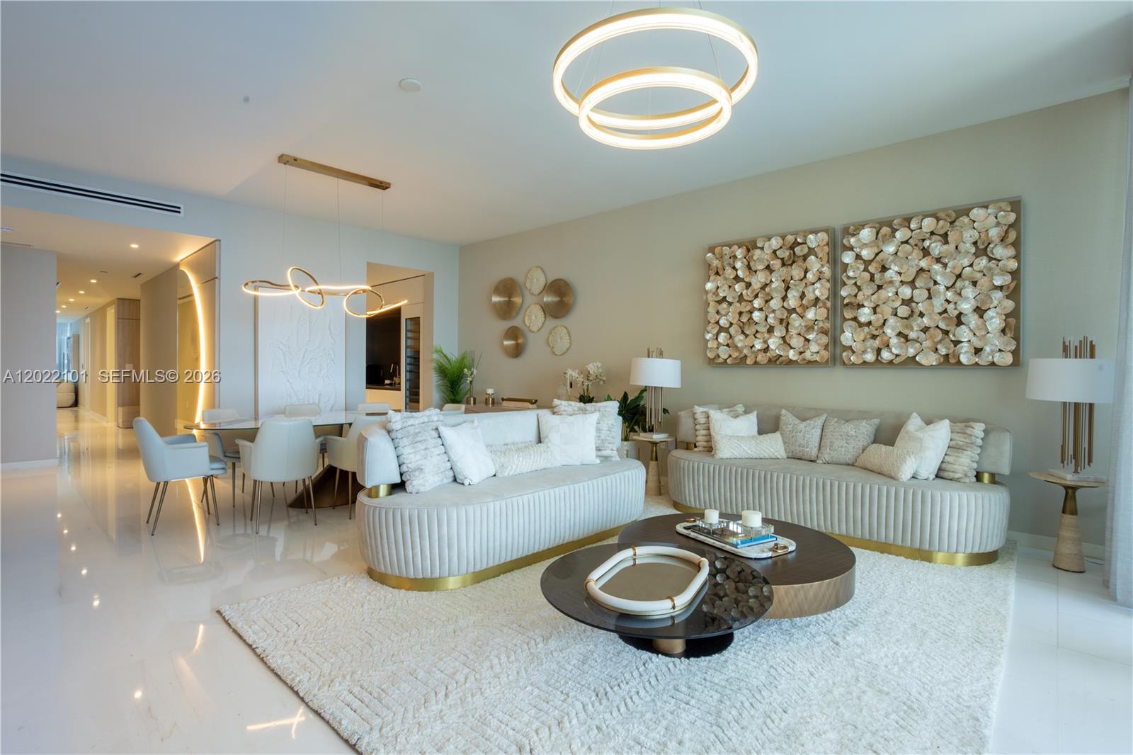 Luxury apartment at Aston Martin Residences with direct views of the Miami river & Bicayne Bay. 3 bedroom + Den + staff room and 4.5 baths, every room has on suite bathroom, walking closet & electric blinds. Top-of-the-line Gaggenau appliances, private foyer, 2 parking spaces.. Enjoy world - class amenities in one of Miami's most iconic building, steps from the best dining, shopping & entertainment.