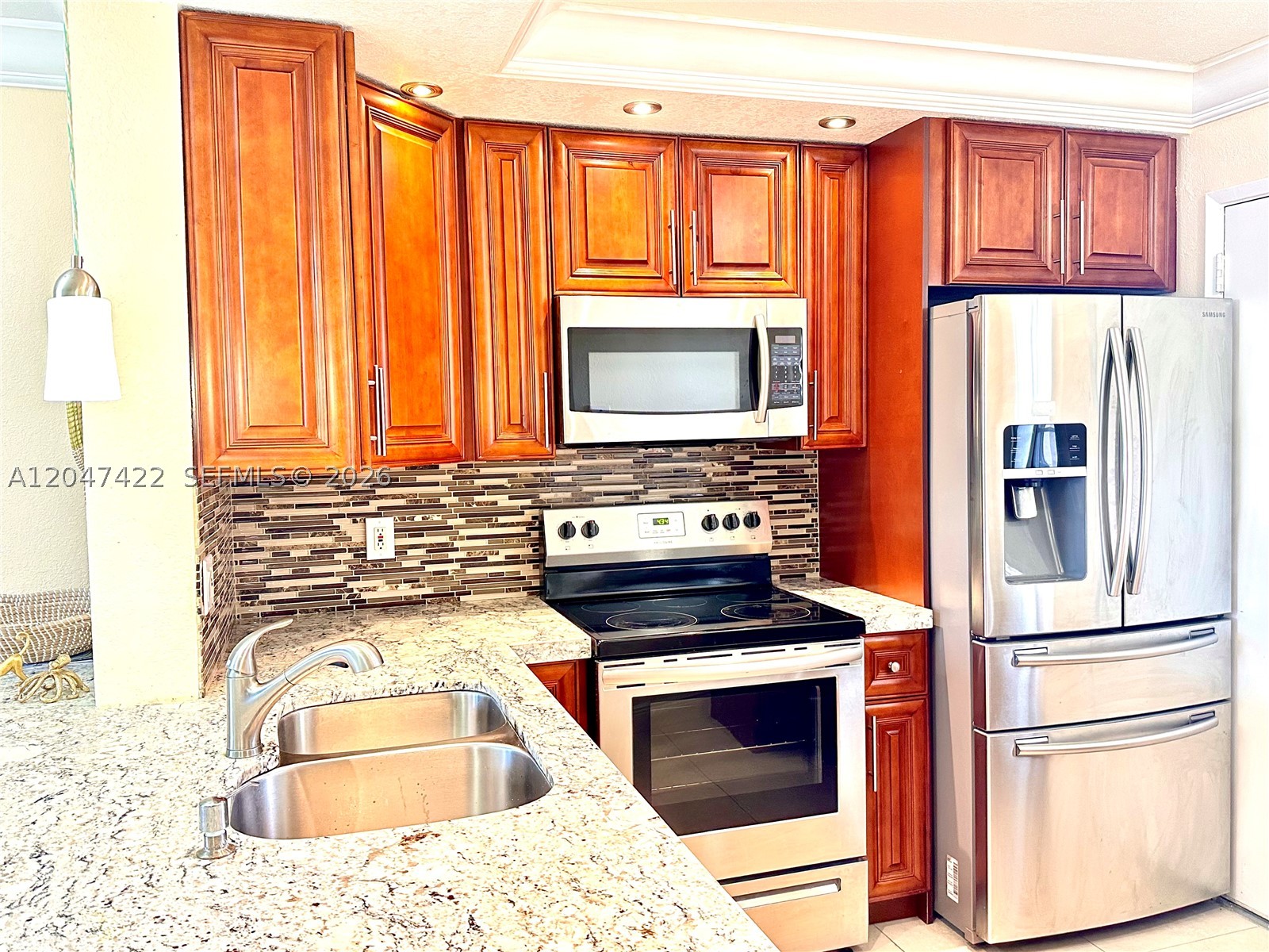 Step into MODERN ELEGANCE with this COMPLETELY REMODELED 1 Bed / 1 bath retreat! Featuring gorgeous TILE FLOORING throughout, this condo delivers a SLEEK & STYLISH ATMOSPHERE from the moment you walk in. Available UNFURNISHED, giving you the freedom to personalize your space. Enjoy SPACIOUS LIVING, a CONTEMPORARY OPEN KITCHEN WITH GRANITE COUNTERTOPS, and a tranquil BEDROOM RETREAT designed for comfort. All in a PRIME LOCATION just minutes from the BEACH, SHOPPING, DINING, and ENTERTAINMENT. Conveniently situated between FLL & MIA AIRPORTS, Gulfstream Park, Aventura Mall, and more. No rentals 1st year of ownership. ALL AGES BUILDING. DON’T MISS OUT. SCHEDULE YOUR SHOWING TODAY!