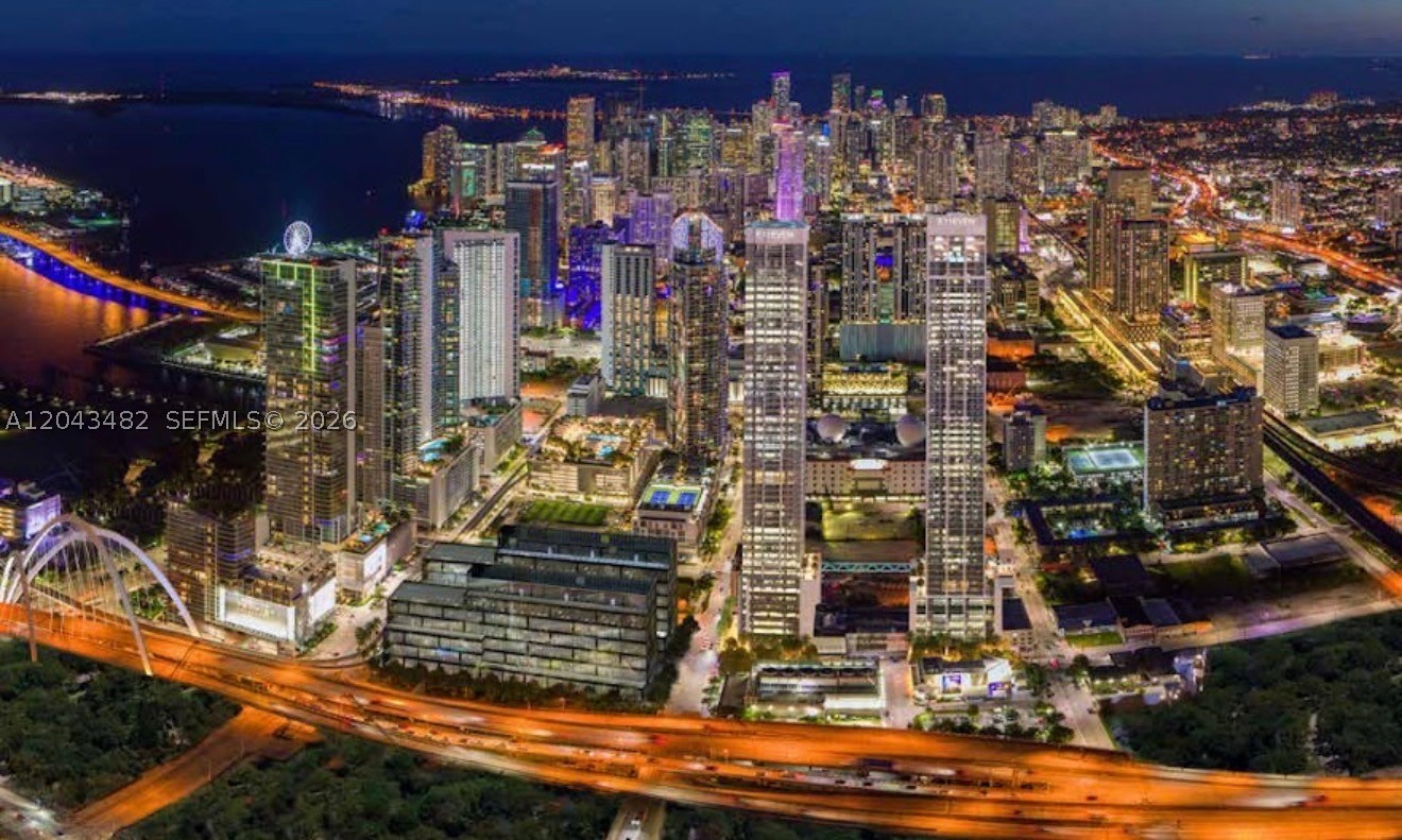 Incredible opportunity to own a stunning 1,169 SF Signature Residence at the iconic E11EVEN Hotel & Residences in the heart of Downtown Miami. Unit 4501 on the 45th floor offers breathtaking city views through floor-to-ceiling windows, featuring premium finishes, fully furnished turnkey interior, and an unparalleled lifestyle experience. This corner residence boasts an expansive open floor plan bathed in natural light. Residents enjoy world-class amenities including 24/7 concierge, rooftop pool, state-of-the-art fitness center, spa, and direct access to Miami's most legendary entertainment destination. A prime investment opportunity with exceptional rental income potential. 1 assigned parking space included.