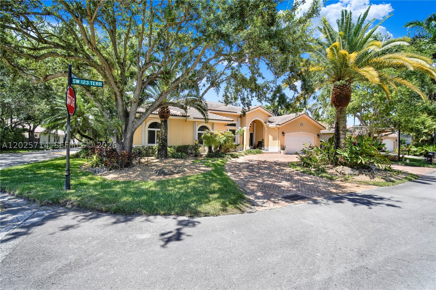 Beautifully maintained one-story,  4-bedroom, 4-bathroom home located in the highly desirable gated/guarded community of Oak Ridge Falls in Kendall! This spacious residence features an excellent layout with high ceilings creating a bright and inviting atmosphere from the moment you enter. It offers a well-appointed kitchen, generous bedrooms, inviting indoor/outdoor spaces, 2-car garage, and a seamless flow perfect for both everyday living and entertaining. 

Step outside to your covered terrace with private garden, lush landscaping, and swaying palm trees—perfect for entertaining or unwinding after a long day. Enjoy the tranquility of a friendly neighborhood. Great community upgrades, including improvements to the main entrance, roads, and landscaping. 

The home includes full impact windows and doors for added storm protection and peace of mind, plus a generator for extra security and convenience during hurricane season. Conveniently located near top-rated schools including Vineland K-8 and Miami Killian Senior High.  As well as shopping, dining, parks, major highways, The Falls, Target, Whole Foods, Baptist Hospital, Ron Ehmann Tennis Park & Palmetto Golf Course. 
 A fantastic opportunity to own in one of Kendall’s most established and centrally located communities! 

This beautiful home is situated on a cul-de-sac.