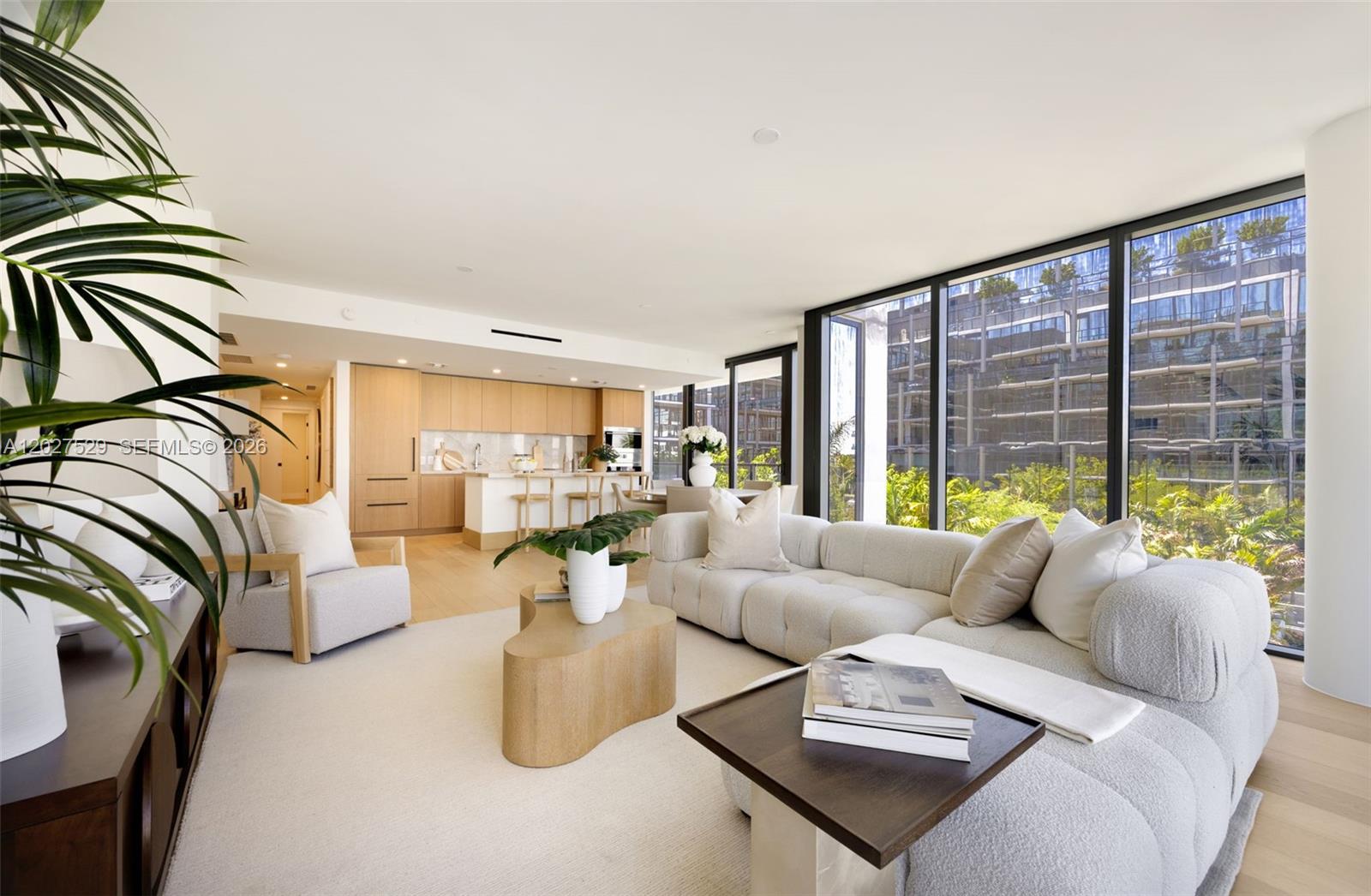 Experience elevated wellness living at THE WELL Bay Harbor Islands, a boutique luxury residential community designed to nurture mind, body, and spirit. This new corner residence offers 3 bedrooms, 3.5 bathrooms, expansive floor-to-ceiling glass windows, and seamless indoor-outdoor living through a private terrace. Thoughtfully curated interiors feature custom Italian cabinetry, quartz countertops, Sub-Zero and Wolf appliances, spa-inspired bathrooms, aromatherapy integration, and advanced air and water purification systems. Residents enjoy over 22,000 SF of world-class wellness amenities, including a rooftop ozone saltwater pool with cabanas, fitness and wellness center, sauna and steam rooms, cold plunge, treatment rooms, tea room, reading lounge, concierge and valet services, and over 150 monthly wellness classes. Additional highlights include a functional medicine doctor onsite, paddle boards and kayaks on Bay Harbor Bay, Zen gardens, and a house car to a private beach club. Developed by Terra Group and David Martin, with interiors by Meyer Davis, THE WELL offers a rare opportunity to live in Miami’s most exclusive wellness-focused community. Ideally located in Bay Harbor Islands, minutes from Bal Harbour Shops, beaches, fine dining, and top Miami destinations. Furnishings by Vesta.