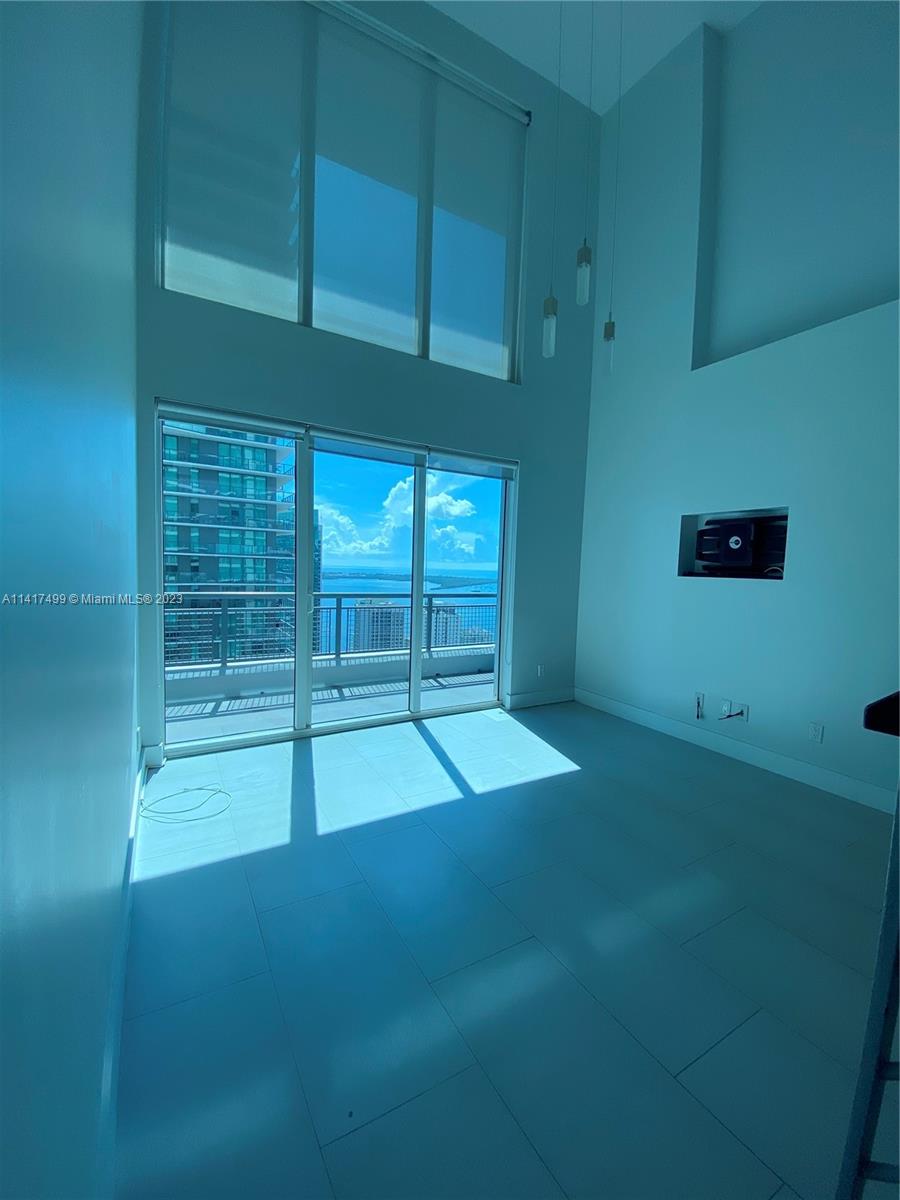 RENOVATED two story loft with double height ceilings. 2 beds / 2.5 baths, spacious floor plan with two extended balconies & gorgeous views of the Miami skyline & city (East & West Views). Unit completely upgraded with lots of storage. SECOND BEDROOM ENCLOSED with bathroom & walk-in closet. Building offers a wide array of amenities including a spectacular roof deck, cafe, fitness center and spa, 24h front desk, full security, & more. Walking distance to Brickell City Center, the financial district, Publix, public transportation. EASY TO SHOW!