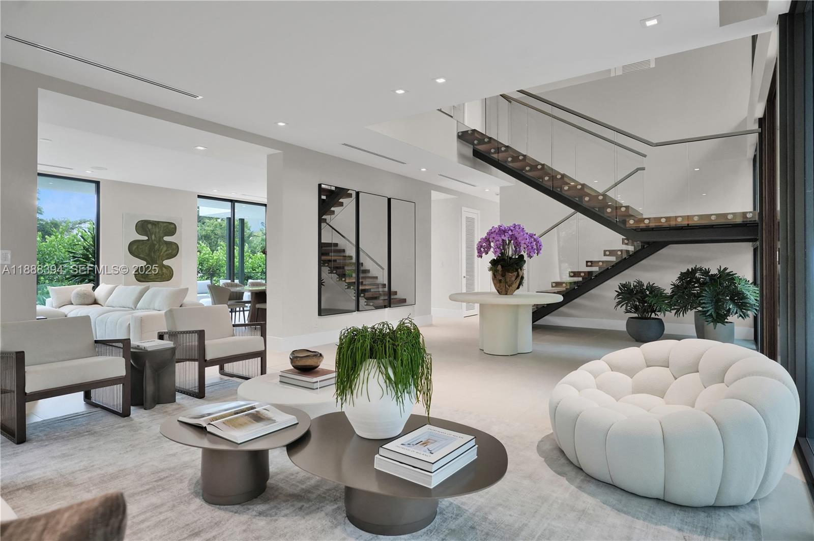 Experience Modern Elegance on the exclusive island of Key Biscayne. Be the first to live in this stunning new construction 5BR/5.5BA residence. Residence features expansive social areas, high ceilings and spacious bedrooms with luxurious closets. High-end Italian kitchen cabinetry, centered around a generous island perfect for gatherings opens to a covered patio with south-facing backyard & pool. A striking walnut staircase leads to 4 en-suite bedrooms upstairs with luxurious closet cabinetry. Separate first-floor suite ideal for staff quarters or private home office. Beach Club Membership available! Resort-style island lifestyle minutes from vibrant Miami, a community complete with top private & public schools, beaches, golf, tennis, marinas & yacht clubs.