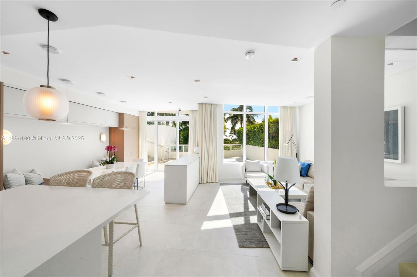 Experience the pinnacle of oceanfront living, a turnkey 4-bdrm, 5-bath residence combining the privacy of a home with The Continuum’s luxurious oceanfront resort lifestyle.  Redesigned in 2023, this stunning residence features custom cabinetry throughout, updated floors, integrated home automation for lighting, audio and shades, Hermes wallpaper, an elevator, and a new chef’s kitchen with Miele and Sub Zero appliances, wrapped in custom oak cabinetry. Skilled design and functionality show off natural light filled interiors and ocean views. The primary suite on a dedicated floor is a sanctuary with a sitting area, custom built-ins, walk-in closet, and European spa-inspired bathroom. Over 1,900SF of exterior terraces include plunge pool, and rooftop terrace offering breathtaking ocean views.