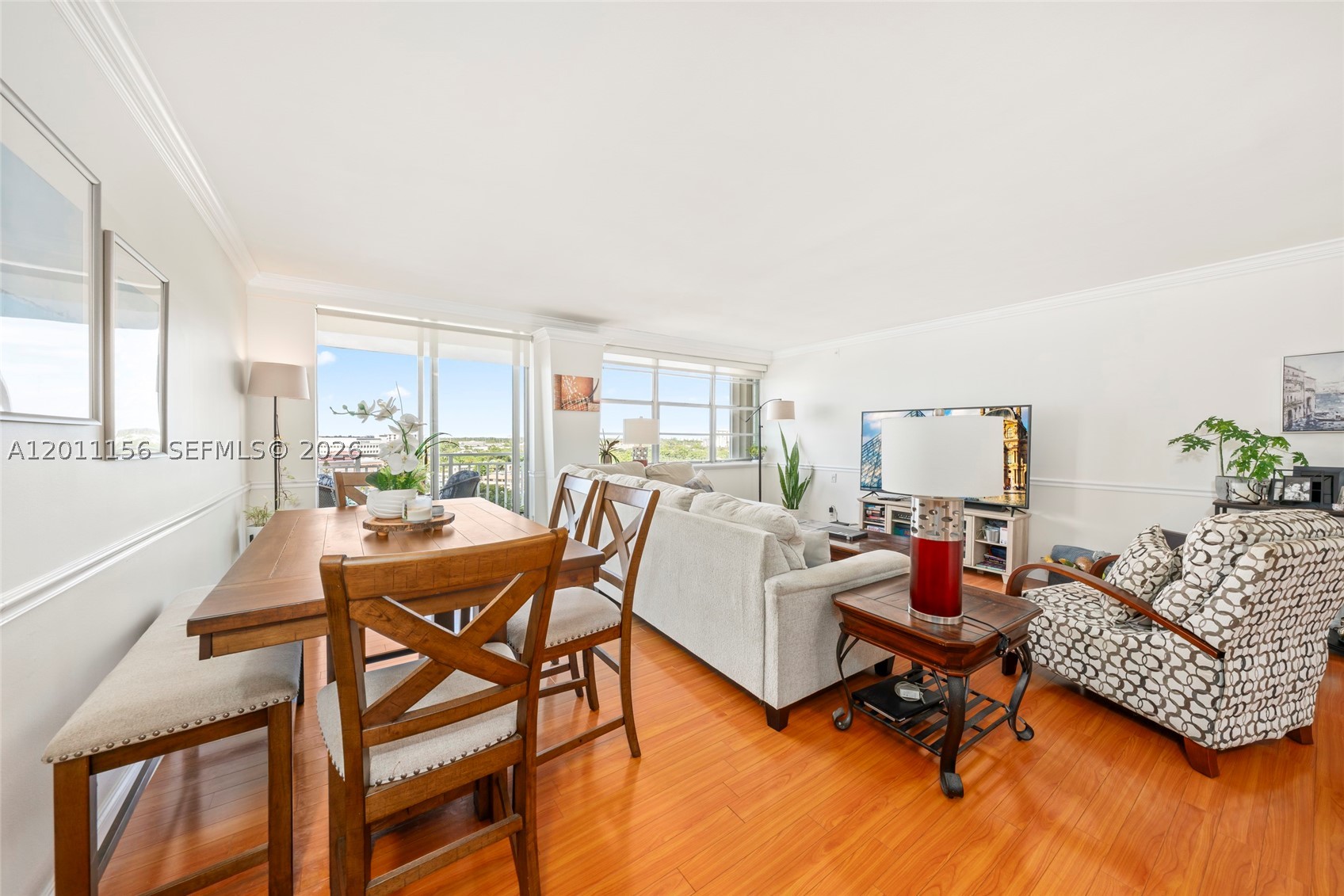 Beautifully updated 2-bedroom, 2-bath residence in highly desirable Sans Souci Estates, just minutes from the Beach & Bal Harbour Shops. This spacious unit features over 1,188sqft of bright living space. Serene City & Water views from both bedrooms. The primary suite includes a walk-in closet. Upgraded kitchen offers granite countertops, stainless-steel appliances, & a stylish backsplash. Additional highlights include hurricane shutters, newer A/C, and a tankless water heater. Enjoy resort-style amenities such as an Olympic-size heated pool, saunas, fitness center, library, lounge rooms, & in-house management. Maintenance covers high-speed internet, premium cable, water, sewer, pest control, & building insurance. Assigned parking & gated entry with ample guest parking.