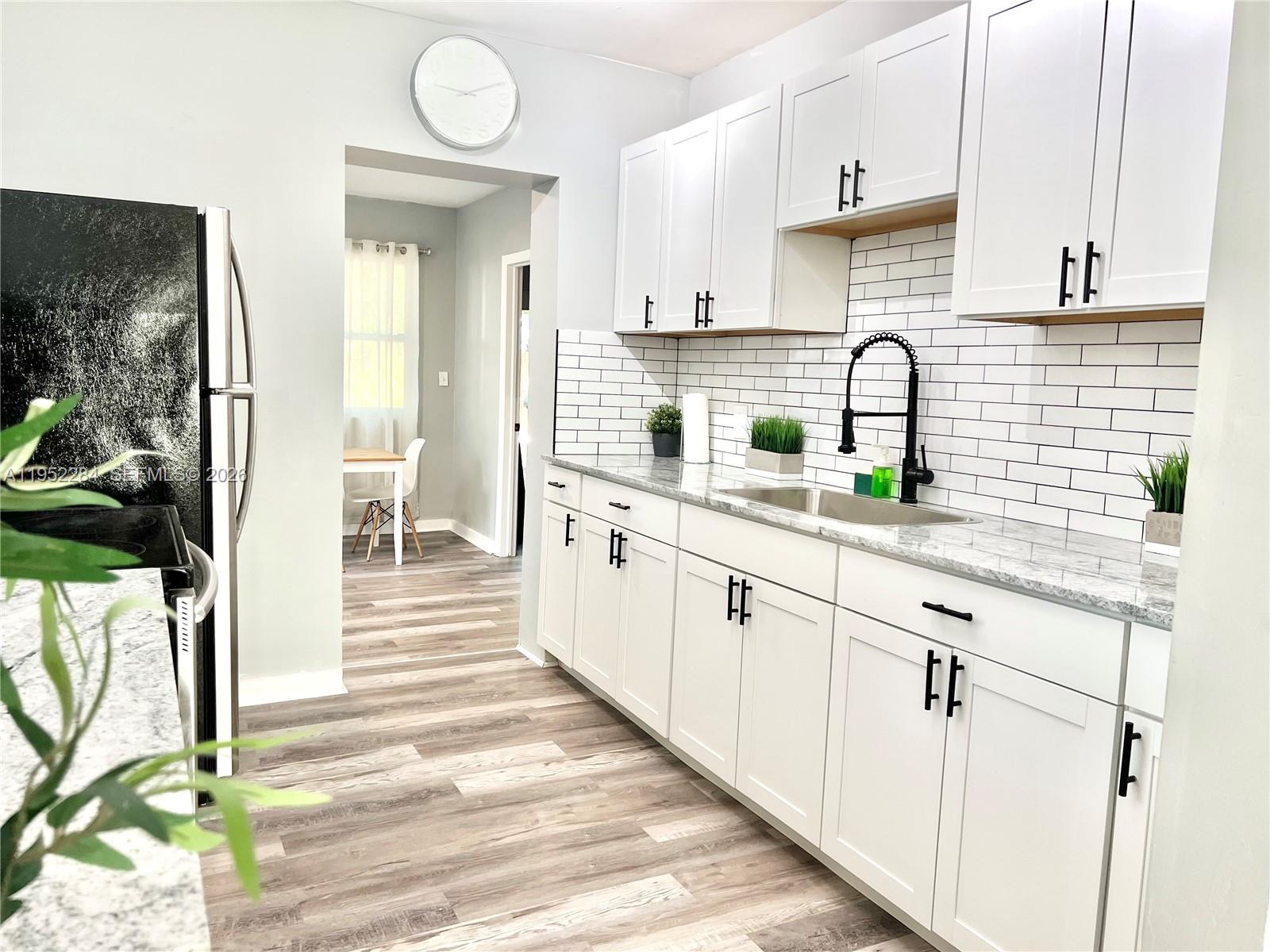 ONLY CASH - Remodeled 3BD/2BA single-family home, smartly converted from a 2/1 to maximize rental income. Located in Fort Lauderdale Opportunity Zone, offering potential capital gains tax advantages for investors. Minutes from downtown, airport, and major corridors, ideal for Airbnb or long-term rentals. Move-in ready with strong cash-flow potential in a growing area. Rare opportunity combining income +tax benefits. Easy to show. Hablamos español.