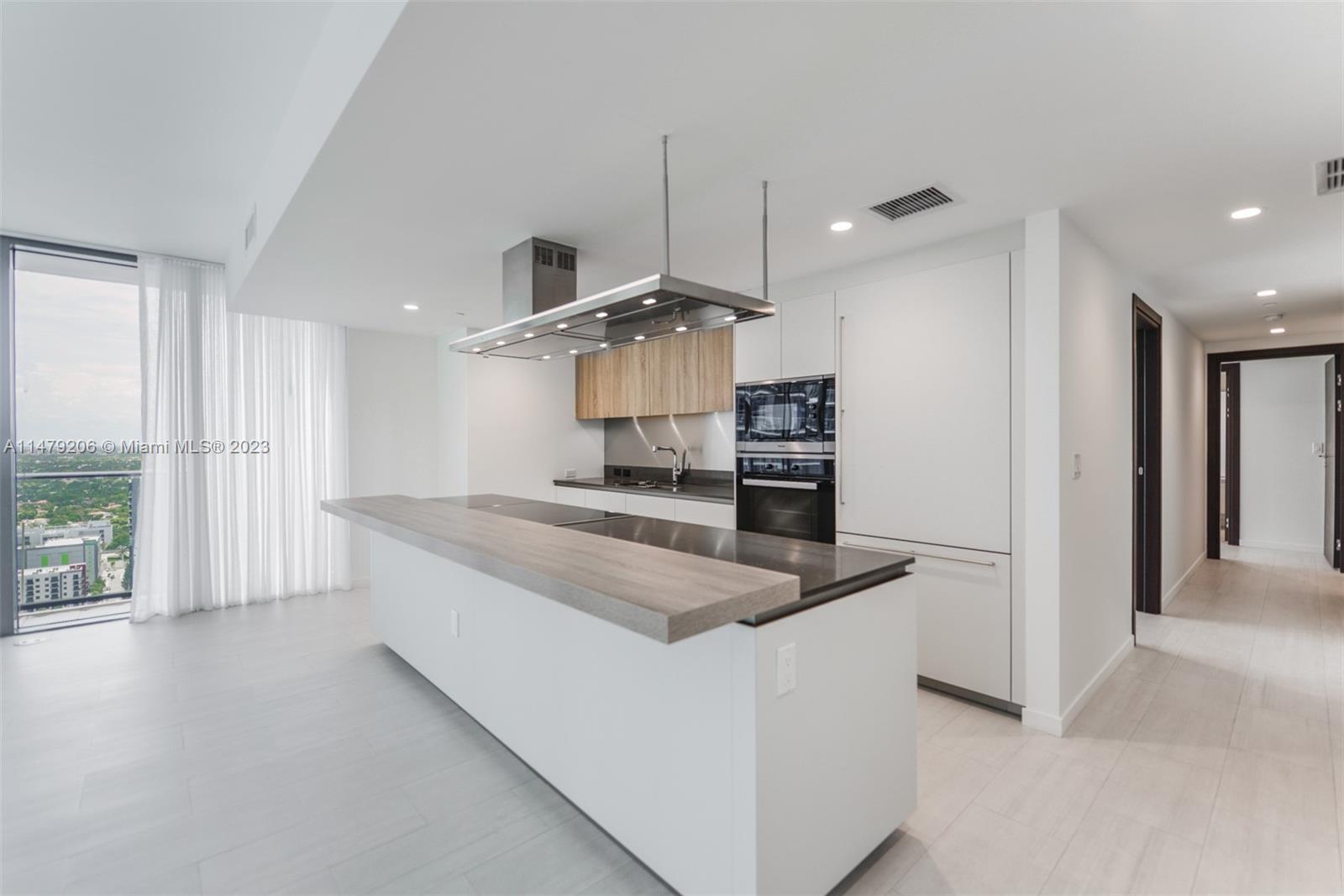Spectacular upgraded unit at the iconic Brickell Flatiron. Huge best corner unit with 3 bedrooms / 3.5 baths! Top of the line Miele appliances, Nest system thermostat, Italian doors, Glass-enclosed showers, Custom made closets & Window treatments, 9-foot ceiling heights, wrap around balcony with amazing views, premium flooring, STORAGE SPACE, among others! Live & play in this luxury building that offers some of the best amenities in the city: Sky club rooftop at the 64th floor offering sky Pool with 360-degree views of Miami & Biscayne Bay, fitness center with the best views of the city, & Wellness Center & Spa. Flatiron Club at 18th & 17th floors offering a private movie theater, outdoor lap pool, children's playroom, social lounge room, billiards room, & concierge service.