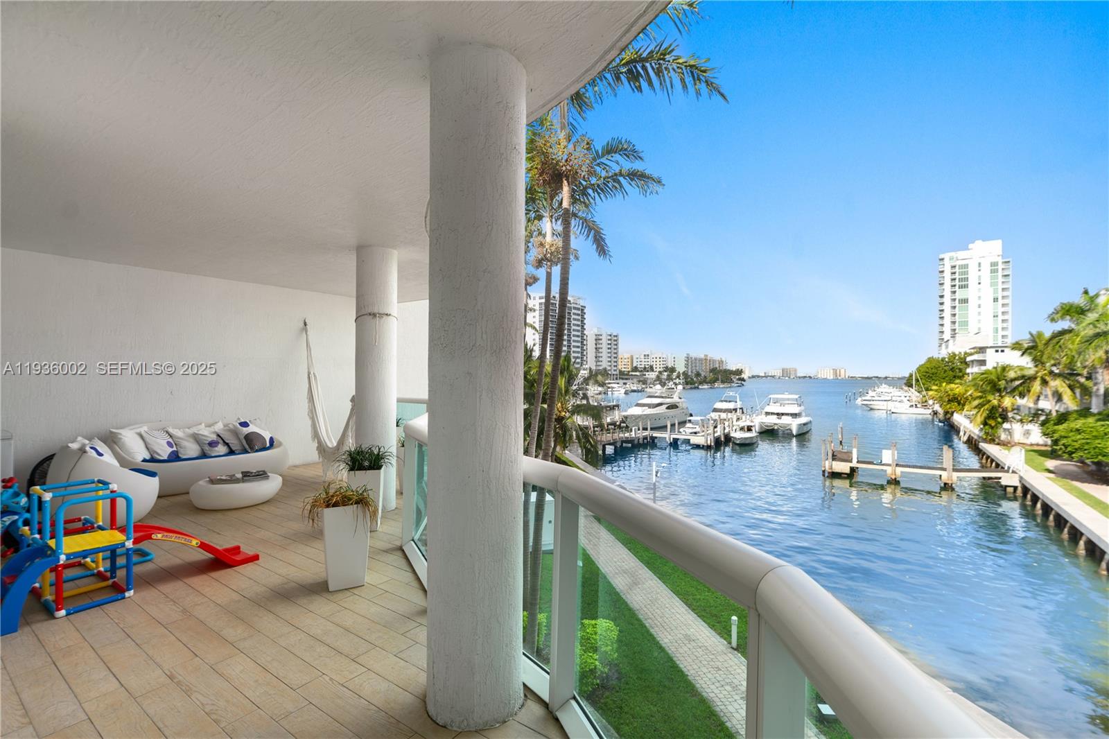 Exclusive marina condo with gorgeous bay views. This premium unit features 9' ceilings, high impact sliding doors and windows, laminate floors, a Euro style kitchen with stainless steel appliances and a large master bath with Roman tub and standing marble shower. It boasts a spacious living room and an expansive terrace great for outdoor entertaining. 360 Condo is a private gated community offering 24 hour concierge and security, free valet, 2 parking spaces and storage, 2 heated pools, sauna, spa and gym, EV chargers