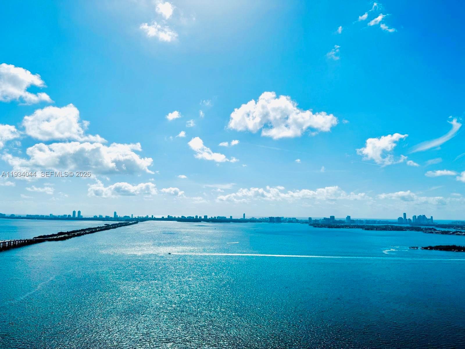 Experience the epitome of luxury living in Unit 3405 on the 34th floor of the prestigious Gran Paraiso. This stunning 2-bedroom, 3-bathroom residence offers breathtaking, unobstructed water views with serene vistas from every room. Enjoy sleek, modern finishes, floor-to-ceiling windows, and an open floor plan ideal for entertaining. World-class amenities include a spa, tennis courts, bowling alley, golf simulator, pool table, gym, and resort-style pool. The unit also includes a reserved parking space for added convenience. Located just steps from the renowned Amara at Paraiso restaurant, this is a lifestyle opportunity you don’t want to miss.Unit 3404, is also for sale. Schedule your showing today!