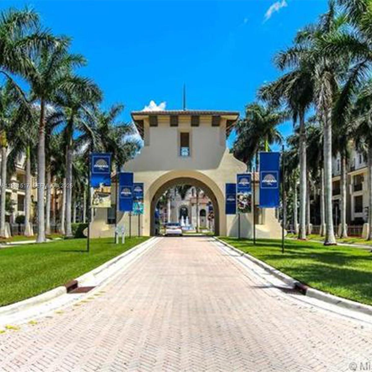 Experience resort-style living at its finest in the prestigious gated community of Artesia! This stunning top-floor 2BD/2BA Villa Flora model features an expansive open layout enhanced by soaring 13-foot ceilings and an abundance of natural light. The residence boasts high-end finishes, including impact windows and a modern kitchen with granite countertops and stainless steel appliances. Retreat to the primary suite, complete with a walk-in closet, dual sinks, a Roman tub, and a separate shower. Enjoy world-class amenities: a grand clubhouse, three pools, a fitness center, sports courts, and a spa. Monthly fees conveniently cover water, gas, cable, insurance, and trash. Perfectly located near major expressways and Sawgrass Mills Mall.