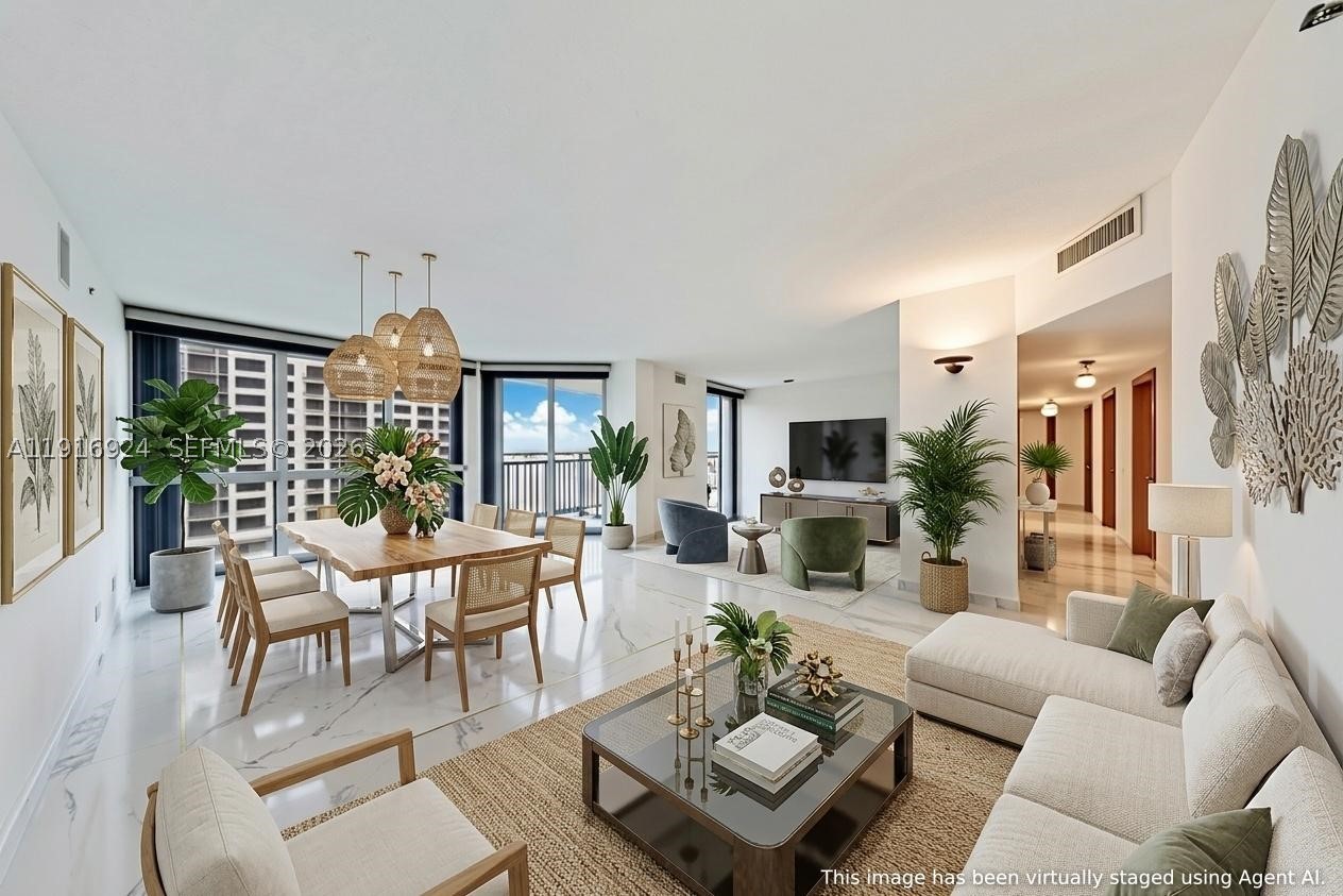 Captivating north-facing water views & unforgettable Miami sunsets set the tone in this refined Brickell Key residence. Marble floors run throughout expansive living & dining areas designed for effortless entertaining, complemented by a sophisticated wet bar & abundant cedar-lined closets. A generous outdoor terrace extends the living space & creates the perfect setting for morning coffee or sunset cocktails. Set within the exclusive island enclave of Brickell Key, residents enjoy 24/7 gated security, concierge & valet service, & onsite management. Resort style amenities include a sparkling pool, fitness center, private library, tennis & racquetball courts, billiards, & a children’s playroom, plus full access to the island’s walkable waterfront lifestyle just minutes from the heart of Brickell. Priced to allow personalization, this is a standout value opportunity for view driven Brickell Key living.