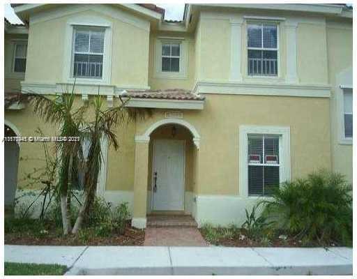 BEAUTIFUL TWO STORY TOWNHOME!!  2/2.5 WITH CARPET & TILE FLOORS. UPDATED KITCHEN. WASHER/DRYER.  TWO LARGE ROOMS WITH A BALCONY OFF OF THE PRIMARY BEDROOM. GATED COMMUNITY WITH 24 HR SECURITY, POOL, CLUBHOUSE, GYM, AND MORE.  CENTRALLY LOCATED.  CLOSE TO "A" SCHOOLS, PUBLIX, NEW SHOPPING PLAZA.  CLOSE TO I-75, SHOPS OF PEMBROKE GARDENS, PEMBROKE LAKES MALL, AND MORE.  MUST SEE!!!