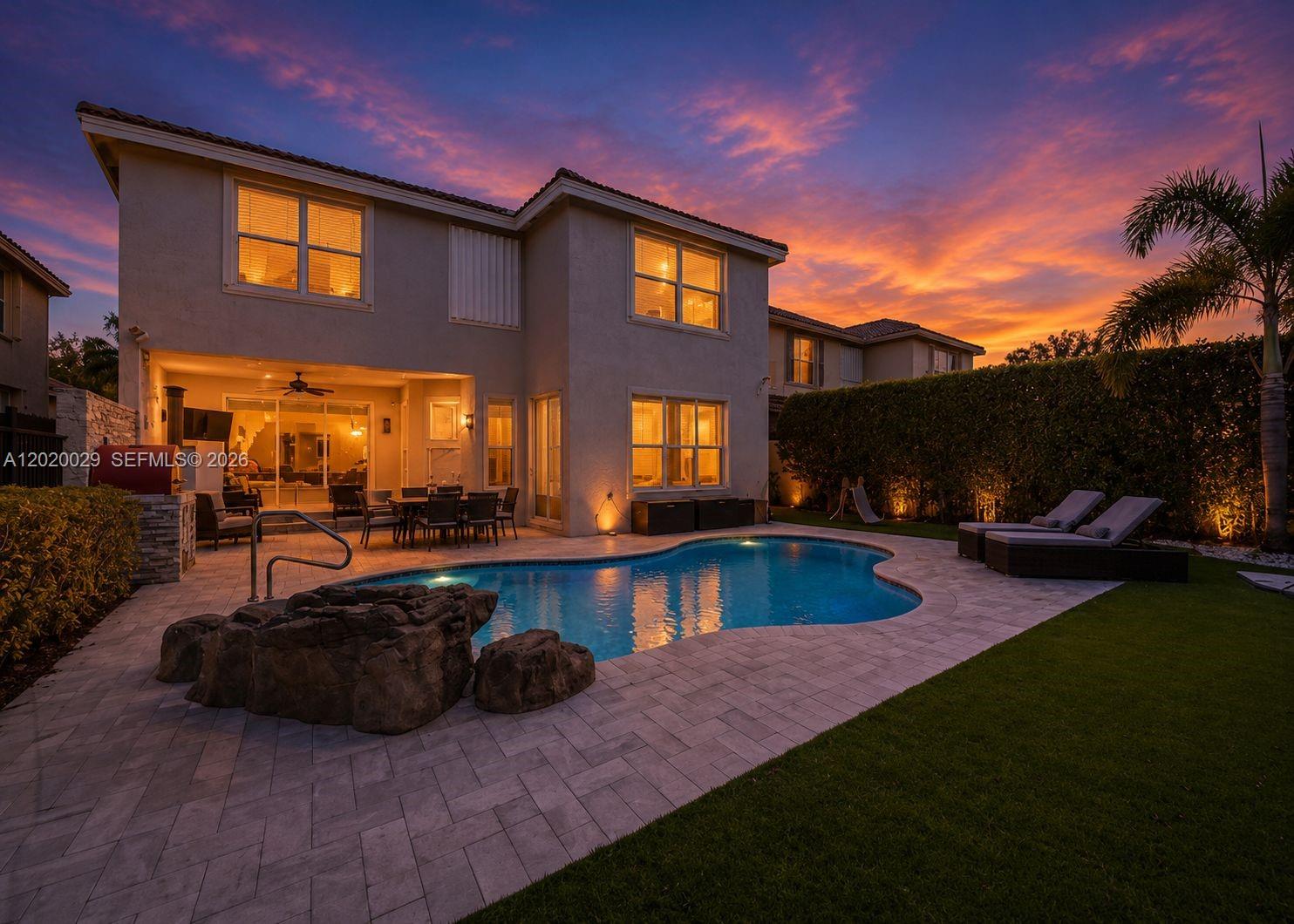 Experience luxury living in this beautifully upgraded 6BD|4BA residence located in one of Delray Beach’s sought-after gated communities. Offering over 3,300 SQ FT, this spacious home features an ideal layout with one full bedroom & bath downstairs, expansive living areas, and multiple balconies that bring in natural light throughout. The renovated interior showcases recessed lighting, updated banisters, custom California closets, frameless glass showers, heated towel racks, upgraded doors, and designer finishes throughout. The gourmet kitchen opens to a breakfast/sitting area and includes custom backsplash, ample pantry storage, and views into the main living spaces perfect for entertaining. Step outside to your private backyard retreat featuring a saltwater pool, oversized pergola, faux grass landscaping, and a large outdoor entertaining area ideal for gatherings year-round. Additional highlights include impact windows, 3-car garage, newer A/C systems, laundry room with sink, surround sound, and custom built-ins. Located minutes from shopping, dining, and major roadways, this move-in-ready Delray Beach home blends comfort, functionality, and upscale South Florida living.
