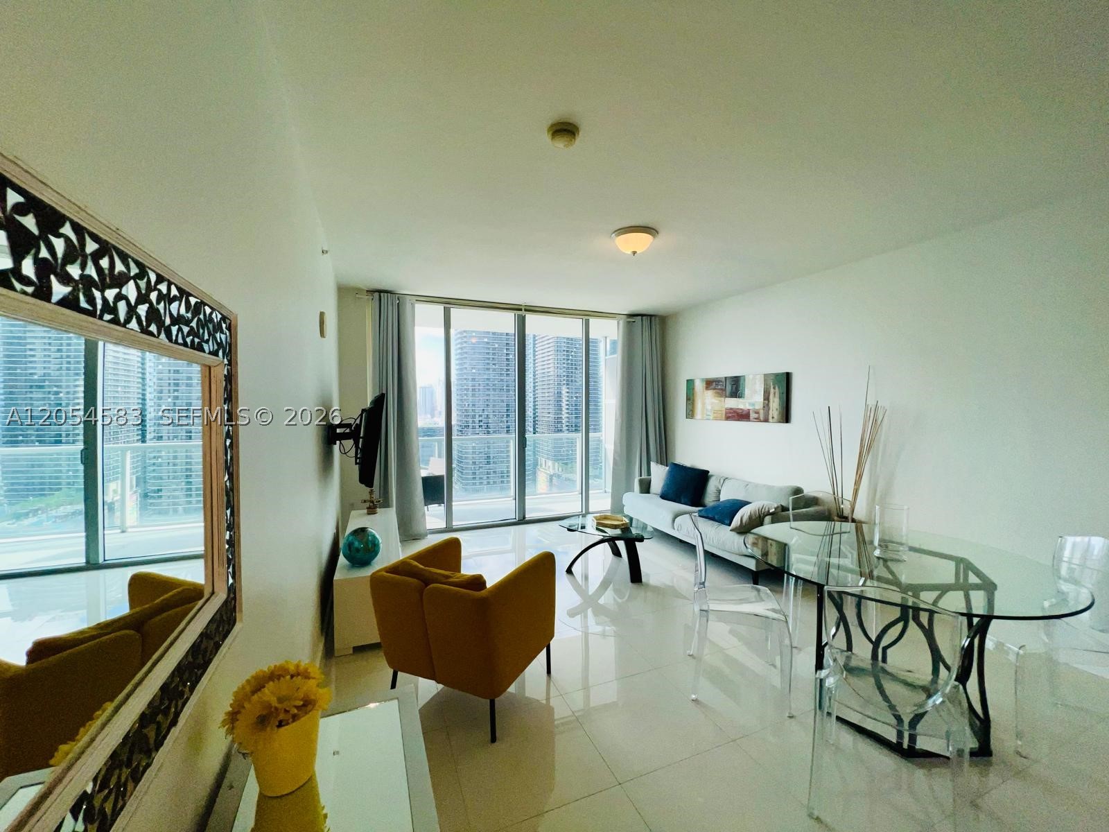 Discover stylish urban living in this well-appointed 1-bedroom, 1-bathroom condo with a dedicated garage space
and a private balcony at the desirable Axis Brickell. This unit offers a comfortable layout, a modern bathroom,
stainless steel kitchen appliances, an in-unit washer and dryer, and contemporary finishes throughout. Enjoy Axis
Brickell's exceptional resort-style amenities, including: State-of-the-art fitness center, Library and media room, Two
infinity-edge pools, BBQ areas perfect for entertaining, Valet parking and concierge services Residents’ lounge for
relaxing or socializing. Located in the heart of Brickell, you'll be just steps away from Brickell City Centre,
renowned restaurants, trendy cafes, shops, and exciting nightlife.