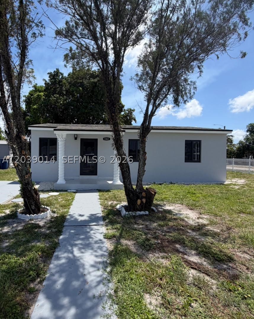 Impeccable 3-bedroom, 2-bathroom home in Miami, fully remodeled and ready to move in. It features modern marble-look porcelain tile floors, a built-in kitchen with stainless steel appliances, luxury bathrooms, and a spacious private patio perfect for family gatherings. A unique opportunity that combines style, comfort, and an excellent location—schedule your tour today before it gets rented!