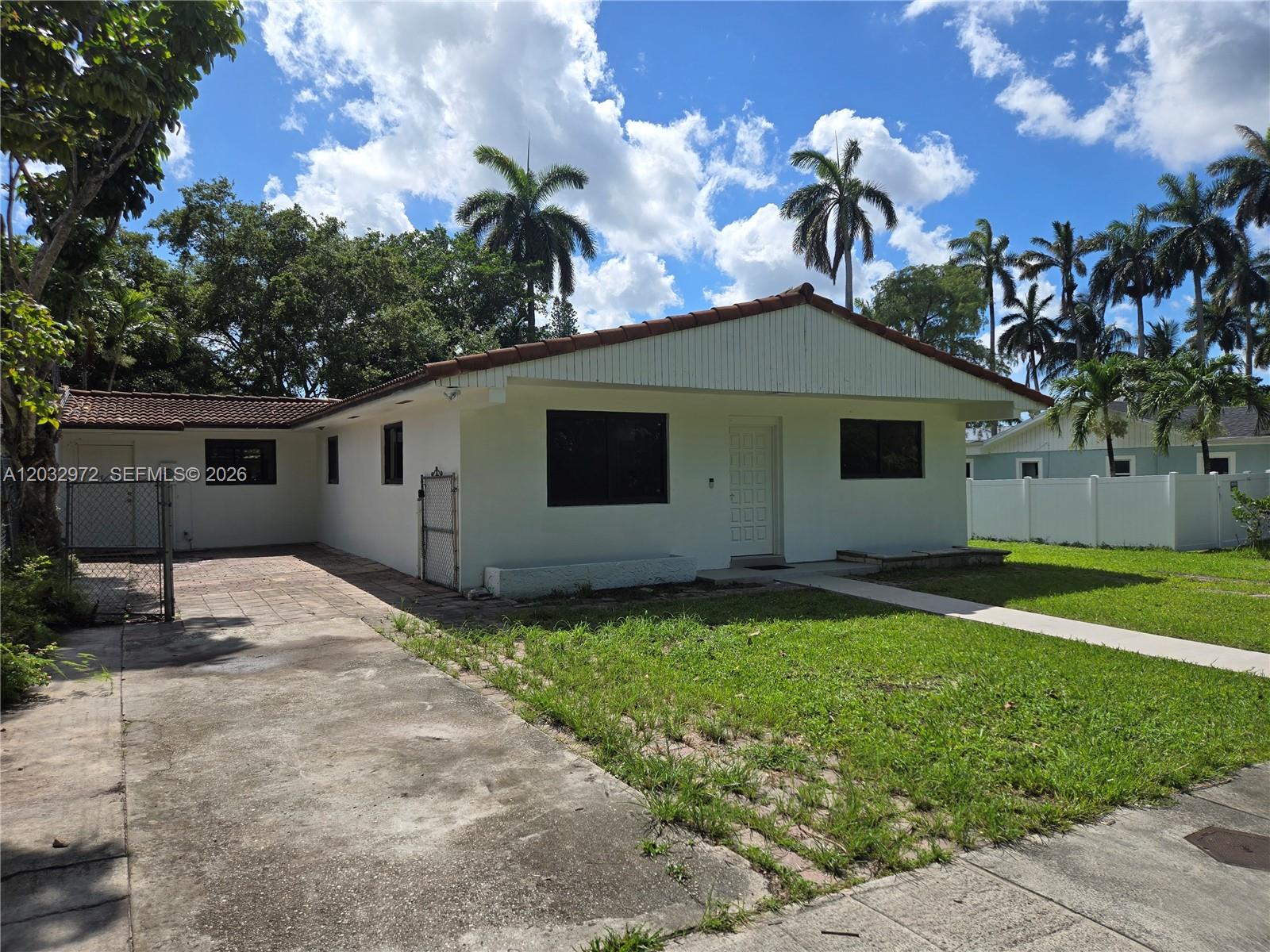 Completely renovated 3-bedroom, 2-bathroom single-family home ready for immediate occupancy. This beautiful residence features brand-new ceramic tile flooring throughout the entire home, freshly painted interior and exterior, and fully remodeled bathrooms with new tile finishes, modern vanities, glass shower enclosures, and upgraded fixtures.

The kitchen offers well-maintained cabinetry in excellent condition and brand-new appliances, including a refrigerator, range, and microwave. A full-size washer and dryer are conveniently located inside the property.

Additional features include impact-resistant windows throughout the home, providing enhanced security, energy efficiency, and storm protection. The property offers spacious living and dining areas, abundant natural light, front and side private entrances, and a fenced backyard with additional side yard space ideal for outdoor enjoyment.

Ample on-site parking accommodates 4+ vehicles. Conveniently located near major highways, schools, shopping centers, restaurants, and public transportation. A rare opportunity to rent a move-in-ready home with modern upgrades and generous outdoor space in a desirable North Miami location.