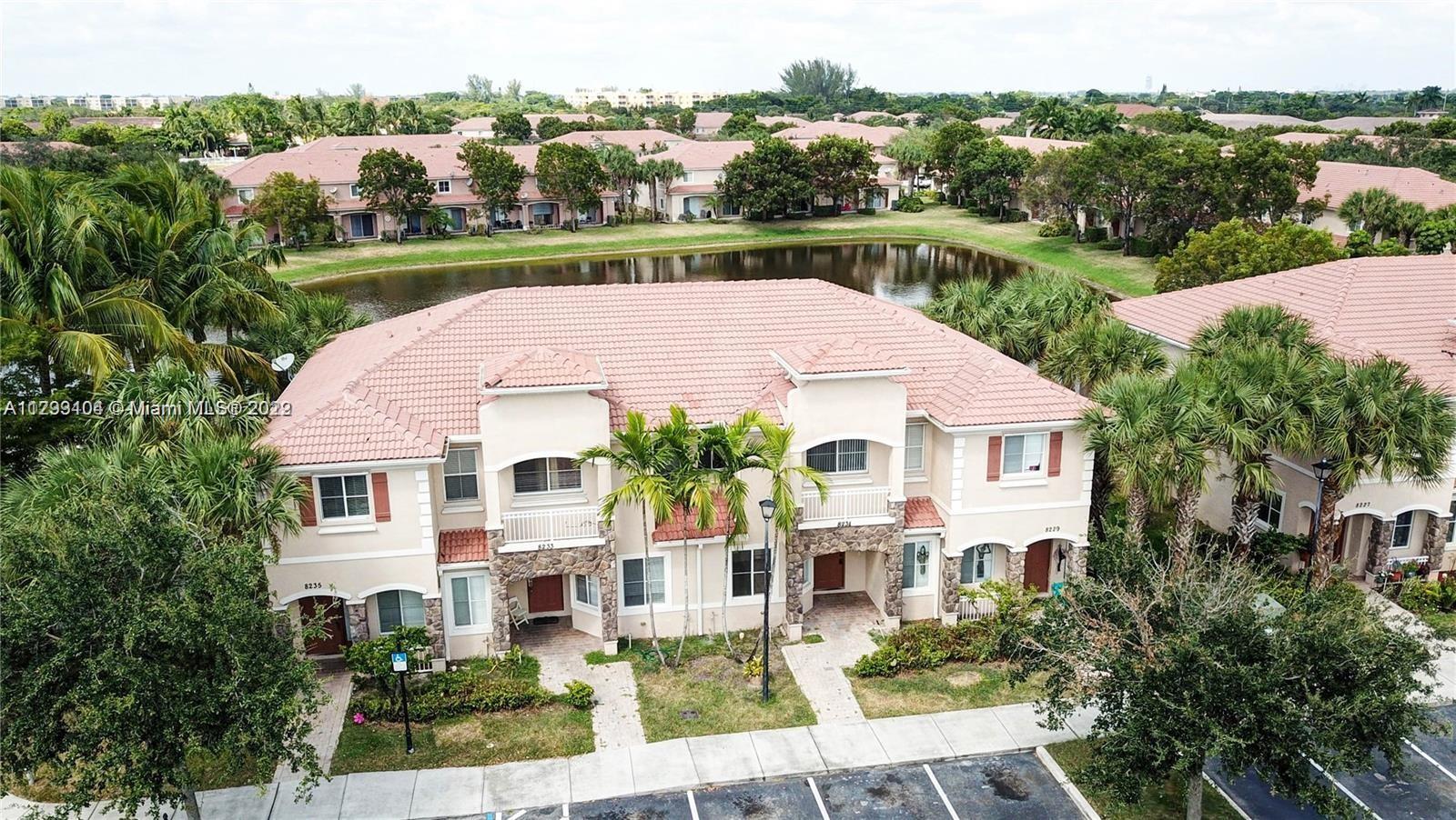 Beautiful 2 story Townhouse, directly to the lake with wonderful views. Gated community with large pool, clubhouse, playground, basketball court and security patrol in well desired community of Tuscany. This spacious 3 beds 2.5 baths Townhouse has first floor entry, granite kitchen with stainless steel appliances, open floor plan with living and dining room, powder room, neutral tiles, patio & storage with Hurricane Shutters.  Master suite, beds 2,3 all with wood floors, stackable washer/dryer on the 2nd floor. Pet okay, 2 assigned parking spaces, plenty of guest parking, centrally located near I95 and TPKE.  Also great for Investors! Property is rented for $2,650 until January 19, 2023. Great Tenant!