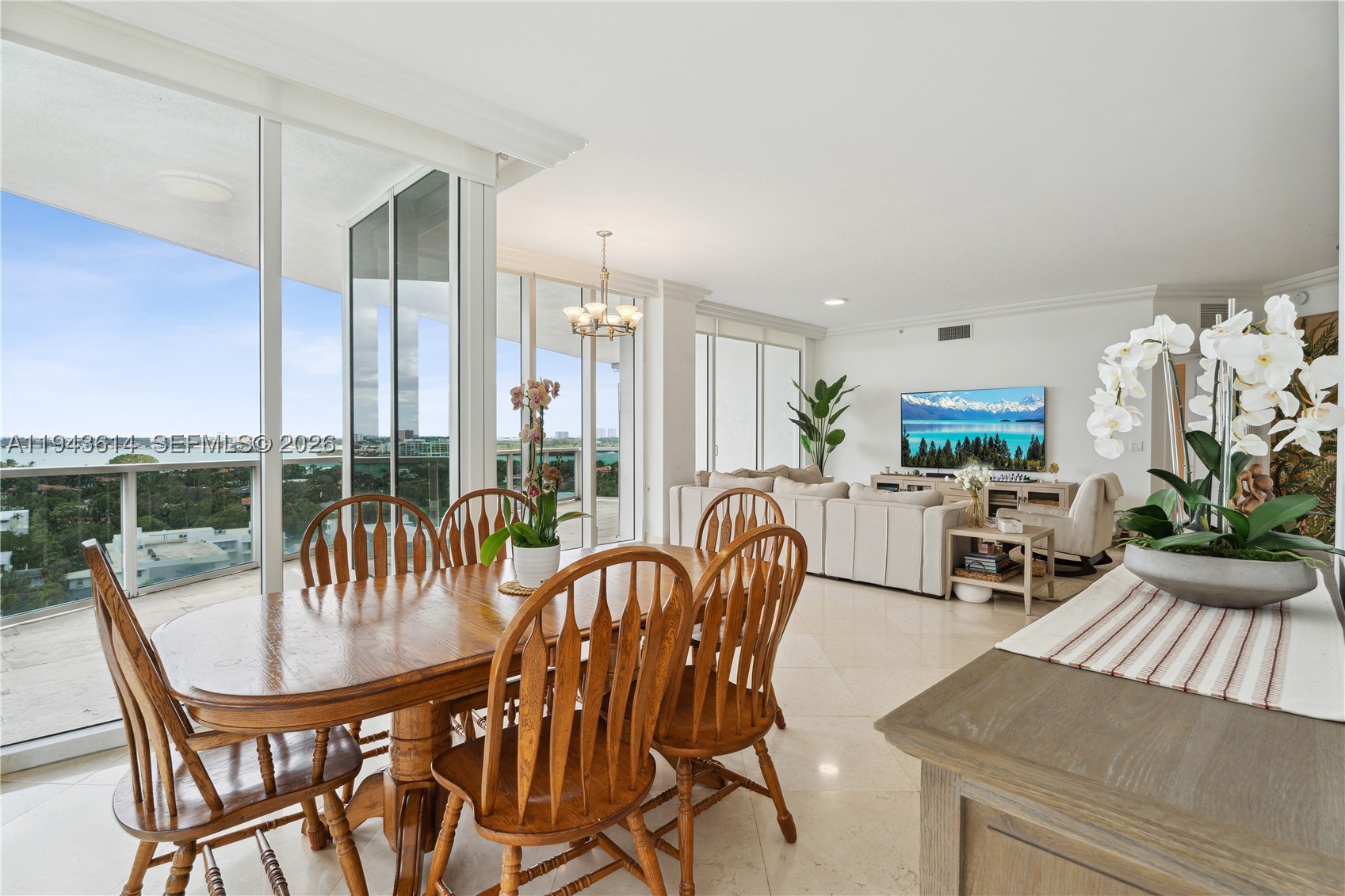 Seize the opportunity to make this Bellini residence your new home, where sophistication meets serenity in the coveted Bal Harbour neighborhood. This exceptional 3-bedroom + staff room, 4-bathroom condo, complete with a staff room, boasts an impressive 2,918 sqft of living space. South West exposure, revel in the best of indoor/outdoor living on the expansive wrap-around balcony with panoramic views of the Intracoastal and breathtaking sunsets. Upon entering via private elevator, you'll be greeted by the airy ambiance created by 10-foot ceilings and an abundance of natural light. The Bellini condominium offers a lifestyle of luxury with a host of amenities, including an on-site restaurant/cafe with both indoor and outdoor seating, a swimming pool, beach service, a fitness center, and a spa