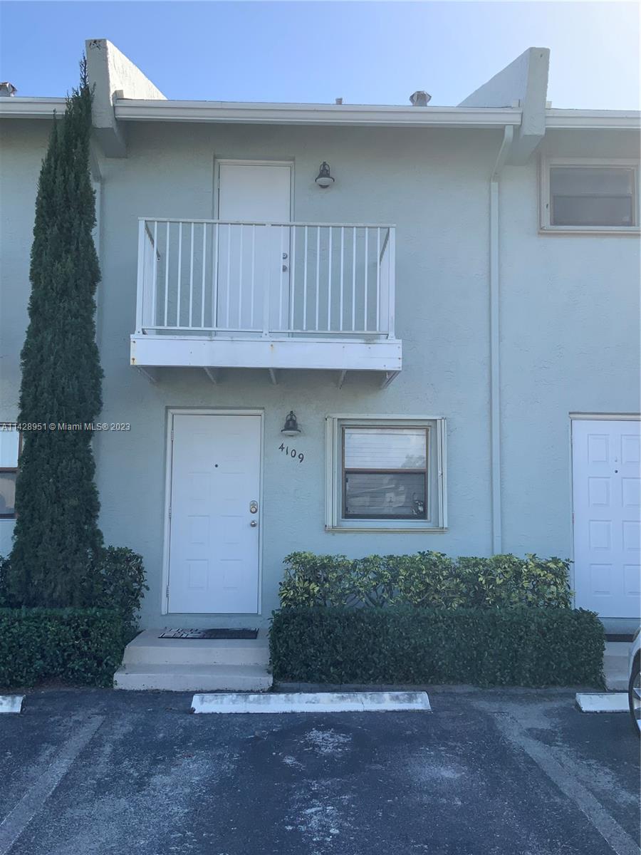 Absolutely stunning! You will fall in love with this 1 bedroom, 1.5 charming townhouse with balcony in The Palms at Lighthouse Point community. The living room opens up to a fenced & paver open patio. Tiled throughout the downstairs, new carpet adorns the stairs and newly installed waterproof flooring upstairs. Accordion shutters. 2018 AC unit and recently painted throughout. The spacious bedroom opens up to a loft area and the closets features cabinetry. Washer and dryer common area room is very close to the unit for convenience. Assigned parking right outside the unit. Per Association, pets are welcome.