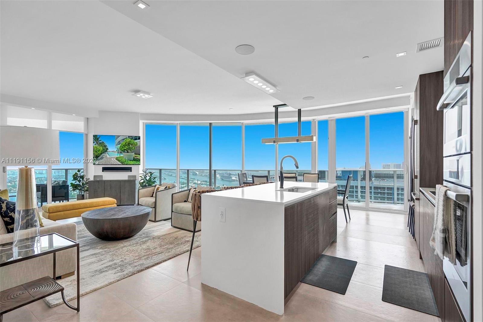 Aria on the bay brings you this STUNNING Fully Furnished/Turn Key beauty in the sky. Remarkably decorated with Restoration Hardware furnishings, Sono's surround sound in every room and custom artwork throughout. 3 Bed + Den/4 Baths with 2,018 SQ FT under A/C in the heart of Edgewater. Wrap around balcony with endless unobstructed water views, walk in closets, private elevator, tandem parking space and amenities that would make anyone never want to leave. Unit is Vacant and ready for it's new owner. Contact listing agent Daniel Horowitz for showings.