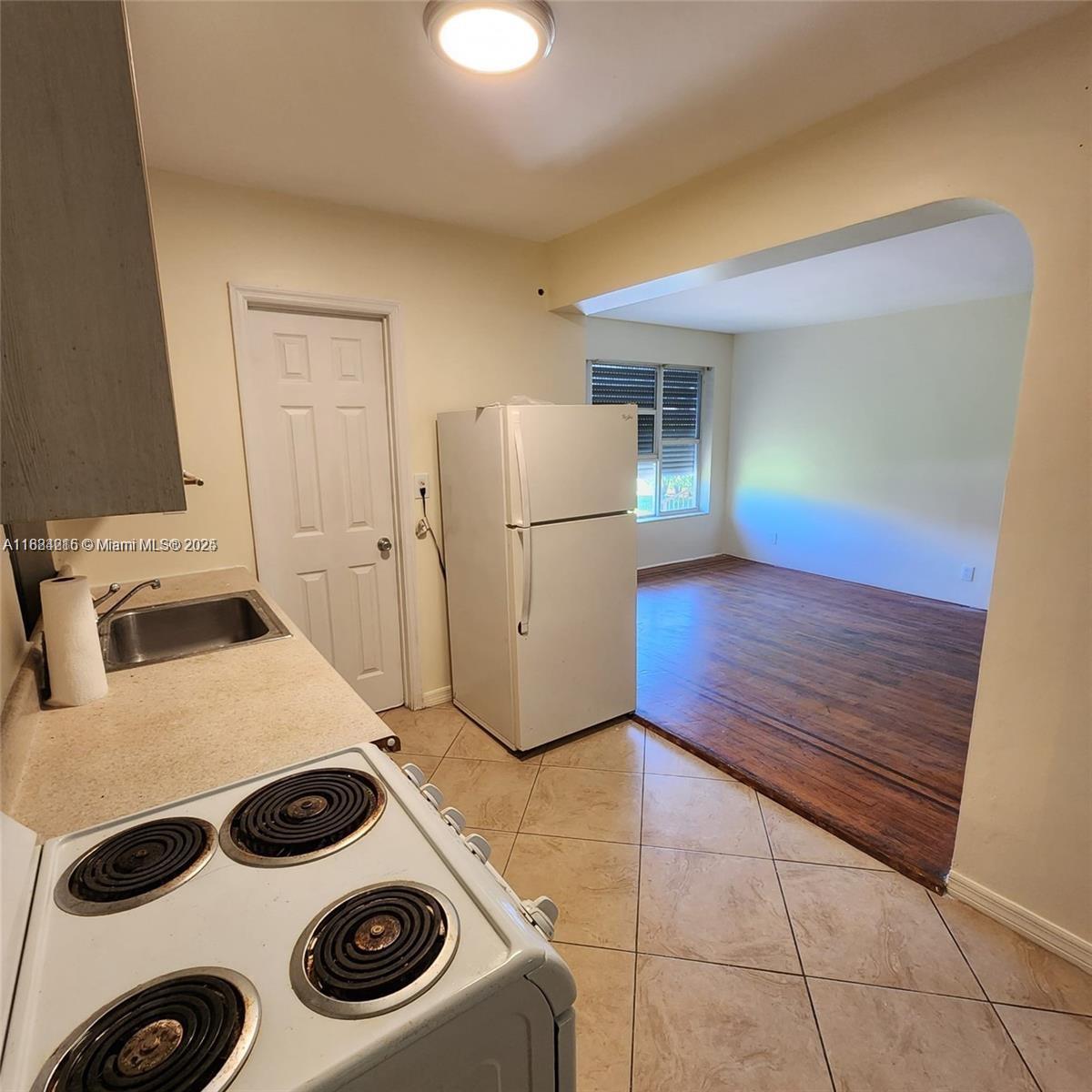 Rare opportunity in the heart of East Hollywood! This property features three separate units – a spacious 2/2, a comfortable 1/1, and an efficiency/studio – making it perfect for owner occupants or investors. Live in one unit and rent out the others, or maximize income with all three. Each unit is well-maintained, bright, and functional, offering flexibility and strong rental demand in this sought-after area. The property also includes outdoor space with room to relax or entertain. Conveniently located just minutes from Hollywood Beach, Young Circle, shopping, dining, and major highways. No HOA – excellent income opportunity!