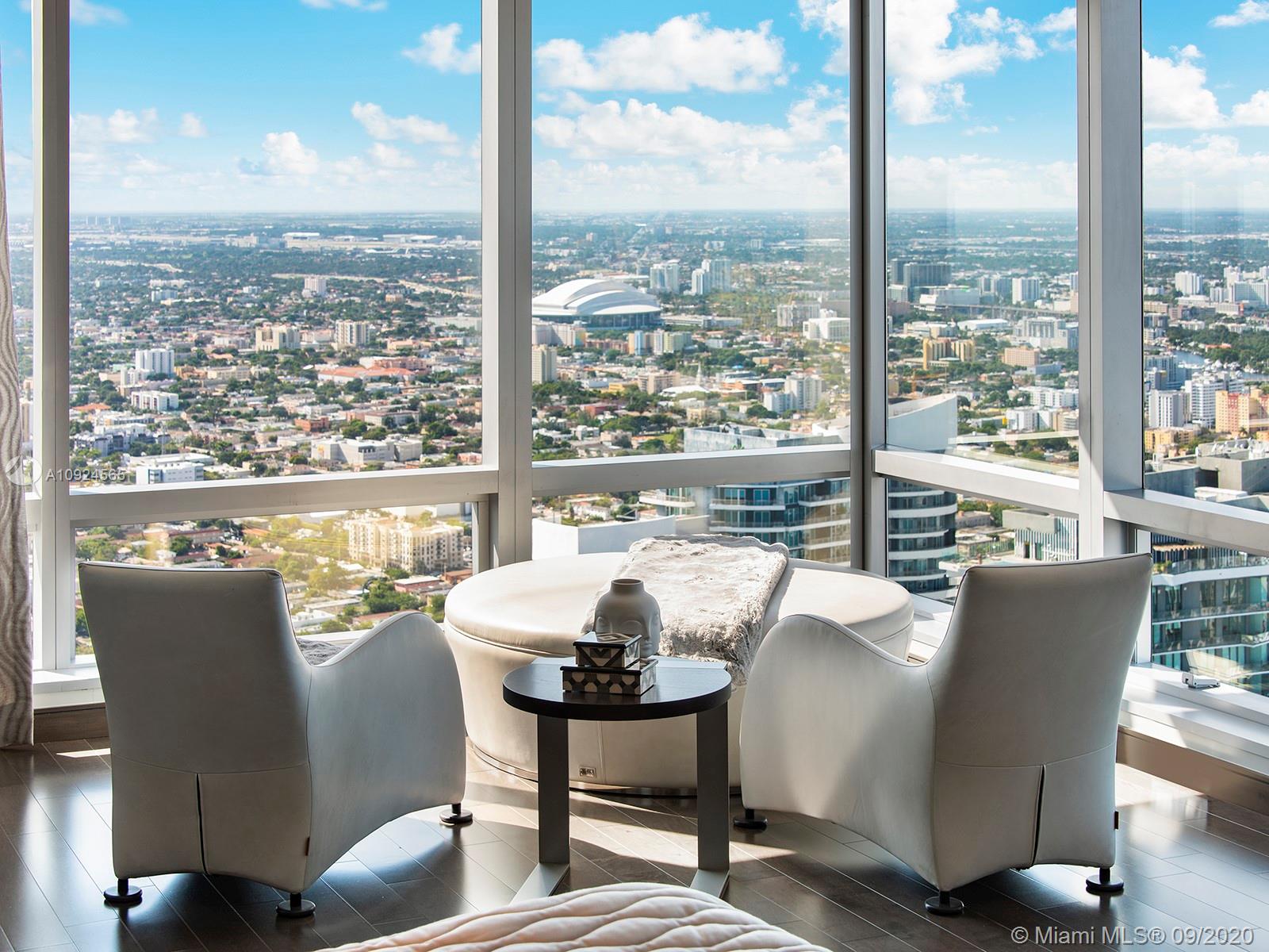 Rising 68 stories above the Miami skyline, this extraordinary PH offers sweeping unobstructed views of the bay, ocean, city, & more! Located inside The Four Seasons, one of the city’s tallest & most exclusive luxury condos, you’ll experience living in the heart of downtown’s refined Brickell neighborhood. Stunningly transformed from 4 units into 1; this PH totals 7,438 SF, 3 spacious bedrooms w/ walk-in closets, en-suite baths, & 2 powder rooms. High-end finishes include rich, warm cabinetry, floor-to-ceiling windows, marble & wood flooring throughout. Enjoy formal living & dining area w/ modern chandelier, an elegant chef’s kitchen w/ slab stone marble countertop, a display wine cellar, an aquarium, conference room, theatre & media rooms. Incl. 4 parking spots, valet available for guests.