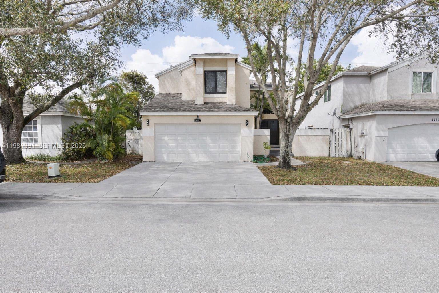 Amazing opportunity! Tastefully updated 3-bedroom, 2.5-bathroom home in Miramar featuring porcelain flooring in the main living areas and carpet in the bedrooms. This move-in ready property offers impact windows, a brand-new roof, remodeled bathrooms, high-end light fixtures, and a beautifully updated kitchen with new cabinets, granite countertops, and stainless steel appliances. The home also includes a new refrigerator, washer, dryer, and water heater, updated closet doors, and fresh interior and exterior paint. The front of the home has been recently remodeled, adding great curb appeal. Additional features include a two-car garage, a spacious yard and a covered terrace perfect for Sunday barbecues. Centrally located in a fantastic neighborhood with a low HOA fee.