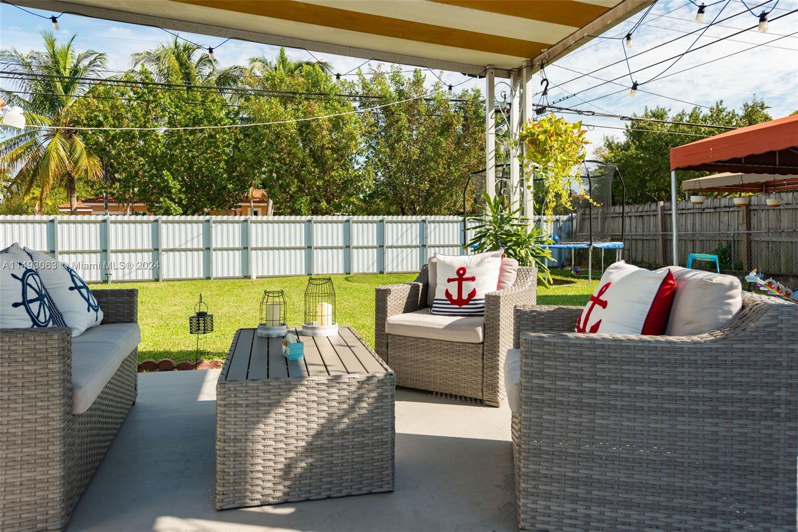 It's a gateway to Miami! This adorable home is Situated on a PRISTINE & PRIVATELY FENCED 7,000 SQ. FT. CORNER LOT, just 10 minutes from Miami Intl. Airport and a mere 7 minutes from the soon-to-come Miami Freedom Soccer Park. The home offers 2 Bed, 1 Bath, Family Room and a separate utility cottage.  It's about Location and Convenience and a great opportunity to own this corner at this price point. MOVE IN READY!