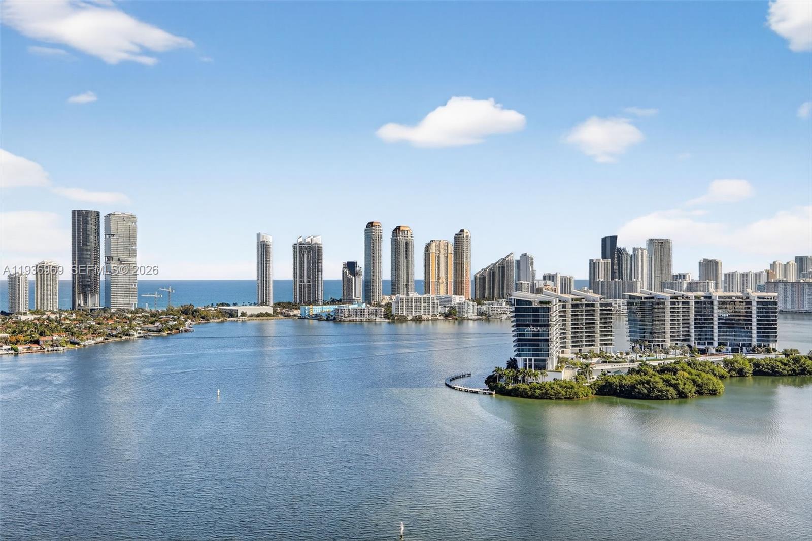 Wow! A 2,720 Sqft Modern Contemporary Masterpiece! Enter From Semi Private Elevator Foyer & Immediately Thru Out See The Best Views In Town. 360 Degree Of Ocean,Bay,City, Golf Course, Marina, Impeccably & Completely Redone By The Finest Artisans & Craftsmen,Nothing Original Remains. $1/4 Of A Million Spent on Remodel. Porcelain/Glass Floor Thru-out, State Of Art Open Kitchen, Electric Window Treatments, Fabulous Split Floor Plan- 3 Beds + Den, Spacious Primary Suite with Room Sized Closet & Private Balcony. Redone Bathrooms, Redone Doors,Redone Everything-show This & Clients Will Fall In Love. A Gem! 5 Star Amenities include: 2 Story Health Club with Large Redone Gym, Spa, Cold Plunge, 2 Pools, 3 Tennis Courts, 2 Pickle Ball courts, Private Marina, Valet, Security, BBQ Area, Library, Kids Game Room, & much more. Seller paid assessment.