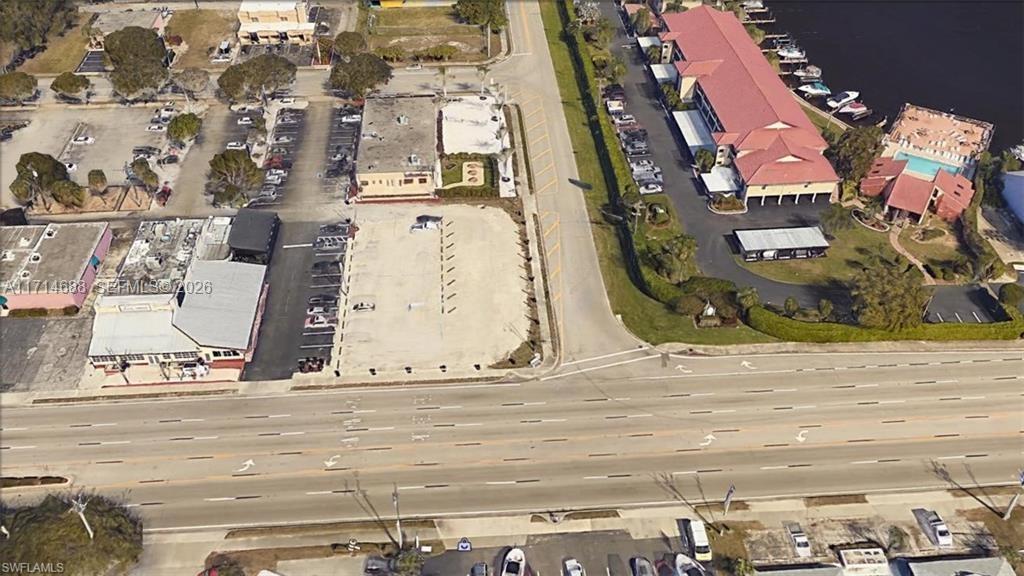 Prime corner commercial development site located on Cape Coral Parkway East, one of the city’s primary commercial corridors. 3 assembled lots 1725 / 1727 / 1729 Cape Coral PKWY E ** together with 0.3525 Acres ** The property offers strong visibility, high traffic exposure, and direct regional connectivity, making it well suited for retail, mixed-use, banking, and drive-thru development. Positioned near Del Prado Boulevard and with connectivity toward the Cape Coral Bridge and Fort Myers, the site benefits from consistent traffic counts of approx. 45,000 to 50,000+ vehicles per day. ongoing corridor improvements and commercial growth Access anticipated via SE 17th Place in line with current planning guidance Zoned South Cape (SC) with Future Land Use: Downtown Mixed (DM) Potential development includes: • retail / pad development • drive-thru concepts • mixed-use development potential for vertical development up to approx. 10 stories (subject to verification ) >>>Seller is motivated and open to offers
