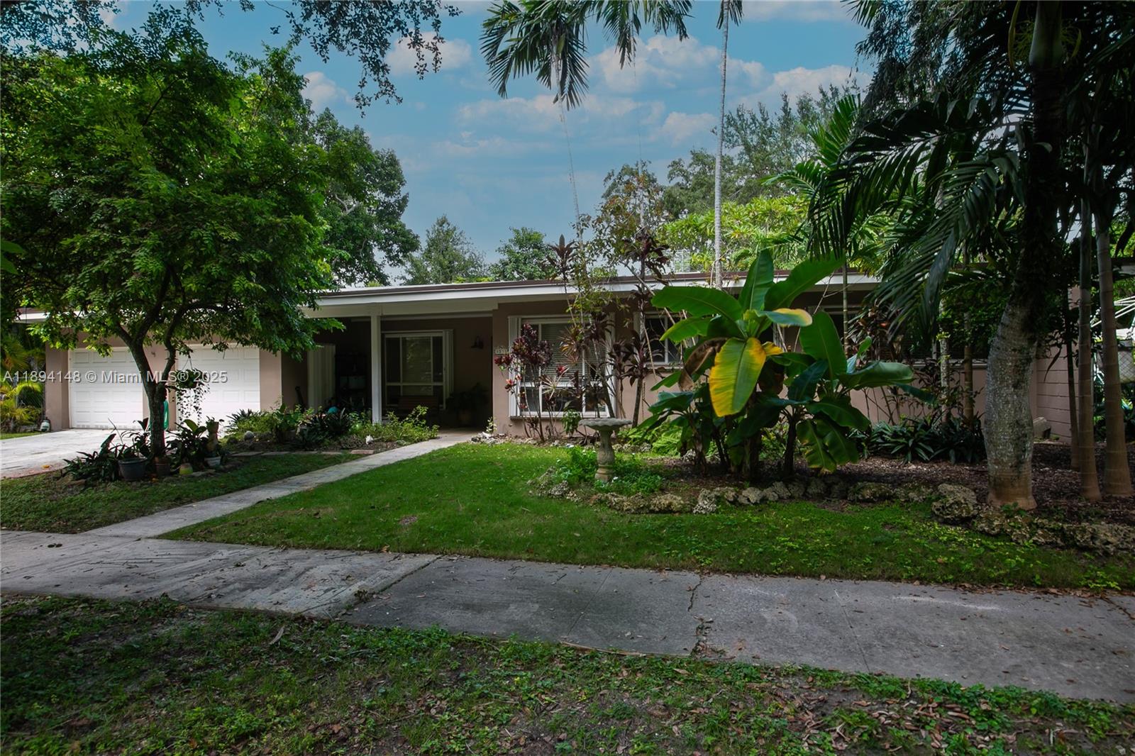 Beautiful Kendal Ranches Home on Expansive 15,000 Sq. Ft. Lot! Tax Collector Lists Building Area at 2,786 Sq Ft. Adjusted Area at 2.229 Sq Ft. Spacious 4-bedroom, 3-bath new roof (2024) & oversized two-car garage.  Plumbing Pipes Recently Relined. Upgraded kitchen w/ granite countertops, stainless appliances, and a versatile breakfast room or office with huge storage space.  Split floor plan, modern baths, primary suite with a sitting area. Relax in the Florida room, or on the screened patio overlooking the peaceful backyard.  Formal dining room, inside utility room, wood-burning fireplace, accordion hurricane shutters, front porch, & a concrete slab for RV or boat parking.  Close to all Dadeland shopping and Baptist Hospital.  Quiet, dead-end street plus easy access to all that you want!