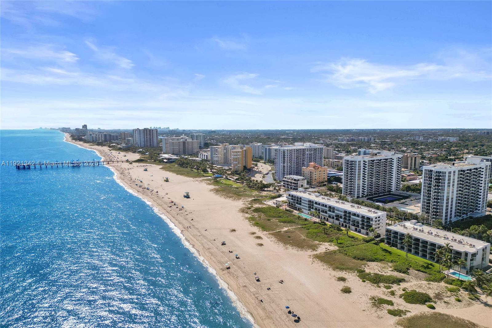 Stunning 2-bedroom unit with breathtaking unobstructed ocean views, located directly on the sand in Pompano Beach near the Pier. Situated on the 3rd floor, it offers a spectacular vantage point of the Atlantic. Floor-to-ceiling window in the master bedroom allows you to wake up to the ocean every morning. Fully furnished beach retreat in a beautifully updated five-story Mid-Century Modern building brought up to today’s standards. Features include impact windows, private patio, washer/dryer in unit, and an open coastal layout. Amenities: private beach access, heated pool, fitness center, sauna, on-site security, elevators, meeting room, exterior storage locker, and one garage parking space. NO pending assessments and PLENTY of reserves—an exceptional opportunity to own a true beachfront escape.