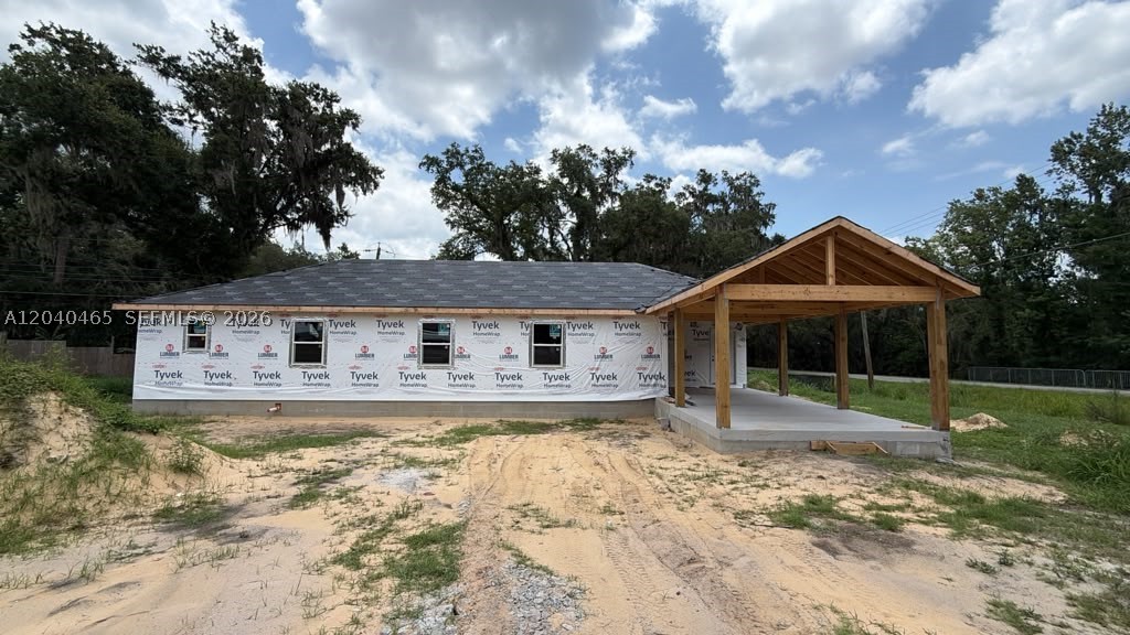 Pre-Construction. 0% DOWN PAYMENT ELIGIBLE! NO HOA! BRAND NEW 2026 CONSTRUCTION scheduled for completion September 2026! This stunning 4-bedroom, 3-bathroom single-family home at 2305 Timbercreek Loop E, Lakeland offers over 1,600 square feet of living space with a modern, open floorplan designed for today’s lifestyle. Situated on a desirable west-facing corner lot spanning approximately 0.23 acres, this home offers added curb appeal, extra privacy, and plenty of outdoor space to enjoy. Built with quality wood-frame construction and connected to city water with a septic system, this home combines modern finishes with lasting value. Enjoy luxury vinyl flooring throughout and the convenience of a 2-car attached carport. All kitchen appliances are included, including the refrigerator, range, microwave, and dishwasher. No HOA means freedom to park your boat, RV, trailer, or work vehicles. Enjoy flexible short term and long term rental opportunities, and truly make the property your own. Ideally located in Lakeland's growing 33805 corridor with convenient access to I-4, Lakeland Square Mall, Lake Parker, shopping, dining, parks, and schools, offering easy commutes to both Tampa and Orlando. Rare opportunity to secure a brand-new home on a spacious corner lot at an affordable price before construction is complete. Seller financing, private financing, and 0% down payment eligible financing options available for qualified buyers. Do NOT wait, it will not last long!