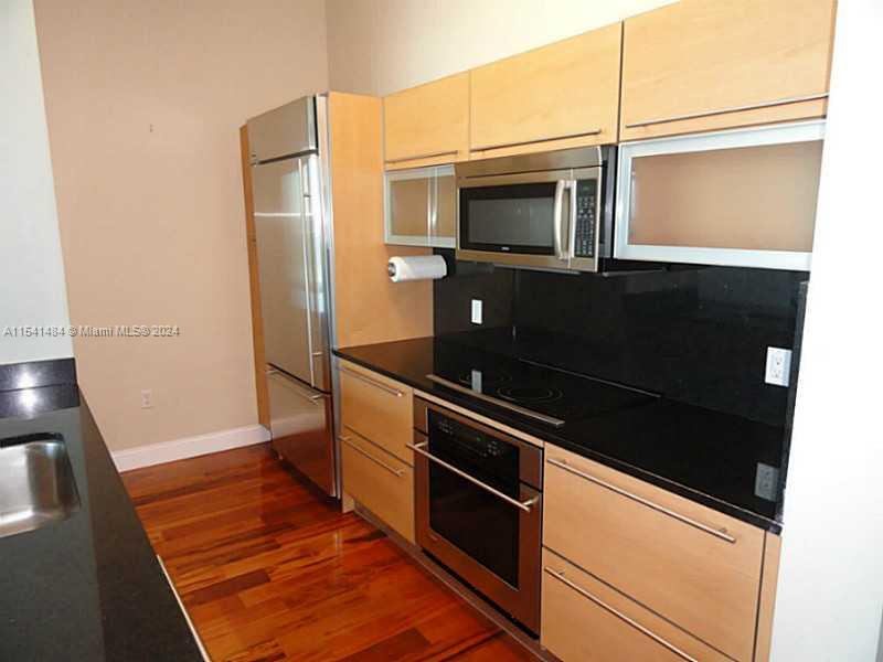 THE PLAZA 851 BRICKELL CO - Residential Lease