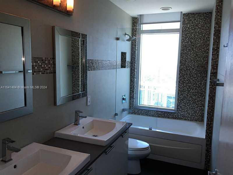 THE PLAZA 851 BRICKELL CO - Residential Lease