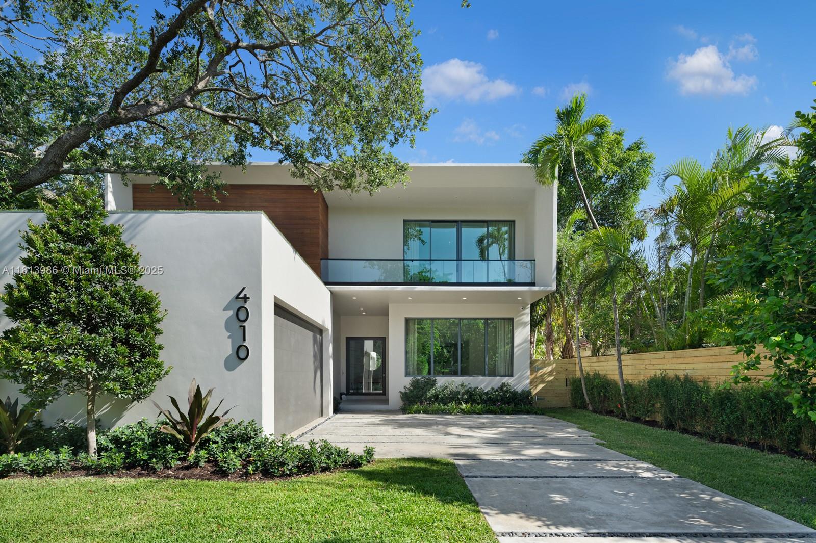 Brand new modern 4,304 sq.ft home being offered fully furnished by Addison House in the heart of Coconut Grove, tucked away on a quiet street in one of Miami’s most desirable neighborhoods. This luxury residence features 5 spacious ensuite bedrooms and 5.5 bathrooms, designed for seamless and elevated living. It boasts exquisite custom finishes, high-end appliances, and an open floor plan flooded with natural light. Smart home technology provides effortless control and enhanced security throughout. Outside, enjoy your private retreat with full summer kitchen and plunge pool —perfect for relaxation and entertaining. Just a short stroll from Coconut Grove’s vibrant restaurants, cafes, parks, marinas, and boutique shops, this is a rare opportunity to own a contemporary masterpiece in one of Miami’s most walkable communities.