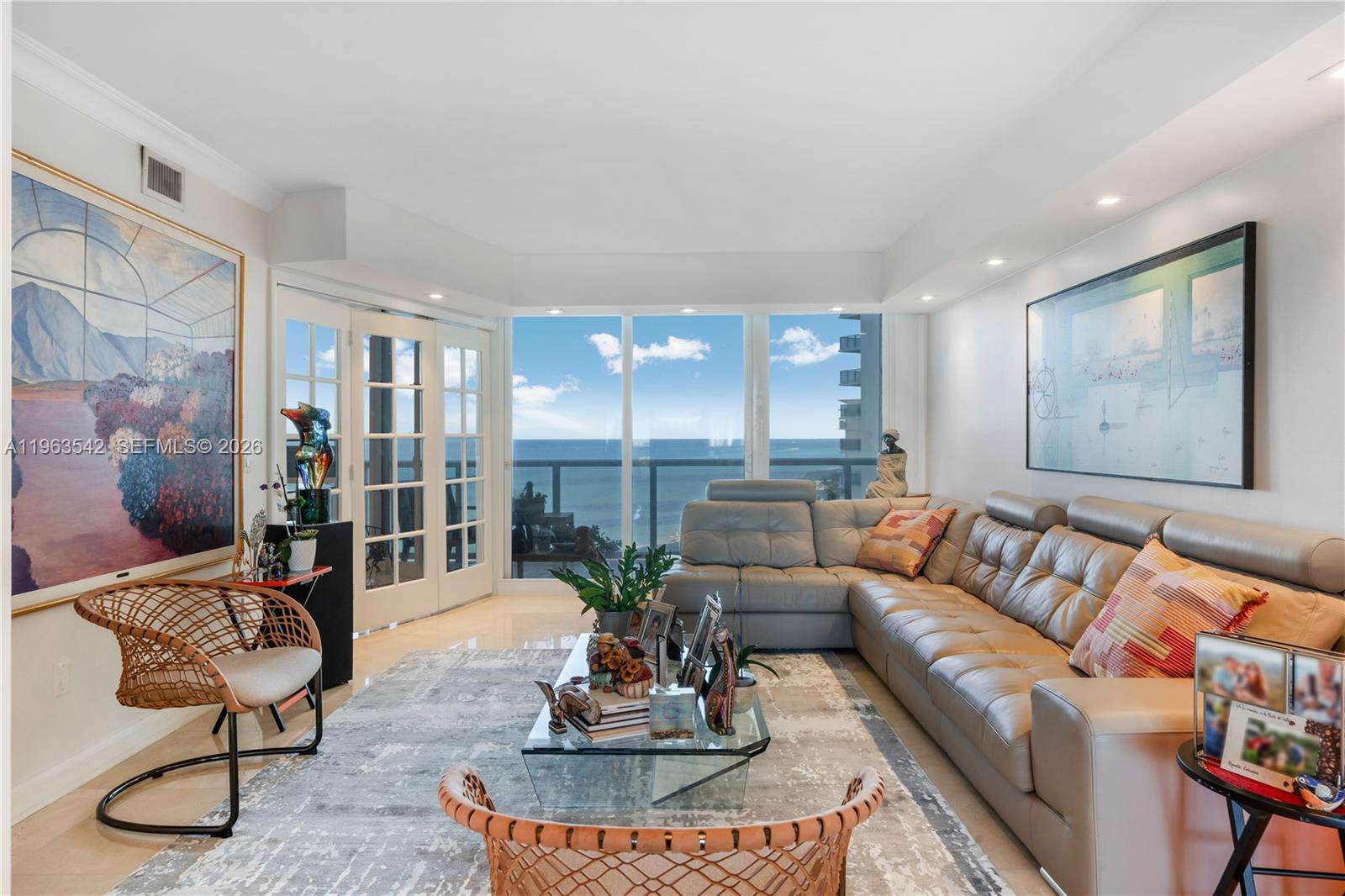 Experience refined coastal living in this impeccably maintained 2-bedroom, 2.5-bath residence plus den at the prestigious Ocean One. Boasting approximately 1,756 SF of interior space, this elegant home offers breathtaking direct ocean and Intracoastal views from expansive private terraces designed for both sunrise serenity and sunset relaxation.A private elevator entry welcomes you into a gracious foyer, opening to a bright and sophisticated floor plan with floor-to-ceiling impact glass that floods the residence with natural light. The spacious living and formal dining areas are perfectly suited for both intimate gatherings and grand entertaining.The primary suite is a tranquil retreat featuring a generous custom walk-in closet, dual vanities, an oversized soaking tub, and a separate glass-enclosed shower. The guest suite includes a private en-suite bath, ensuring comfort and privacy. A full-size laundry room and elegant powder room complete this thoughtfully designed layout.Ocean One delivers resort-style beachfront living with direct beach access, attended beach service, oceanfront pool, spa, state-of-the-art fitness center, tennis courts, 24-hour security, concierge, and valet. Ideally located in the heart of Sunny Isles Beach, moments from fine dining, luxury shopping, and parks.An extraordinary opportunity to own a distinguished residence in one of Sunny Isles Beach’s most sought-after oceanfront buildings.