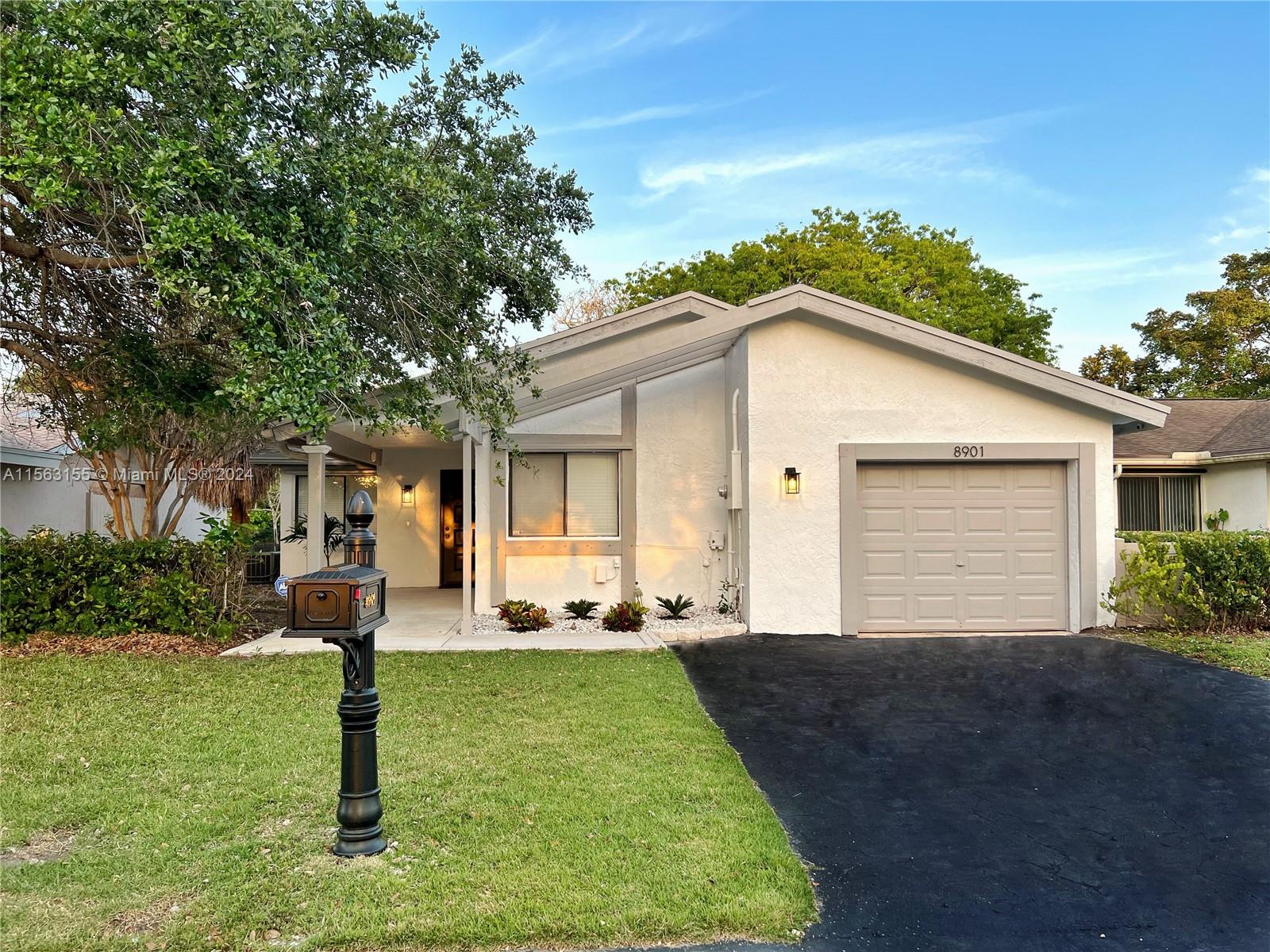 Welcome to modern living in Plantation, FL! This recently renovated 3-bed, 2-bath home is a contemporary gem. Featuring a sleek kitchen with quartz countertops, new appliances, chic fans, and flooring, it seamlessly blends luxurious style with functionality. The split layout ensures privacy, while the fenced backyard offers tranquil waterfront views. With three patios, including a secluded retreat, there's ample space for relaxation. Washer and Dryer included. Situated in the exclusive Bayberry Village, residents enjoy access to a serene community pool. Conveniently nestled near highways, schools, and shopping, this sanctuary offers unparalleled convenience. Experience luxury living at its finest! Be the first to call this pristine sanctuary home - schedule your viewing today.